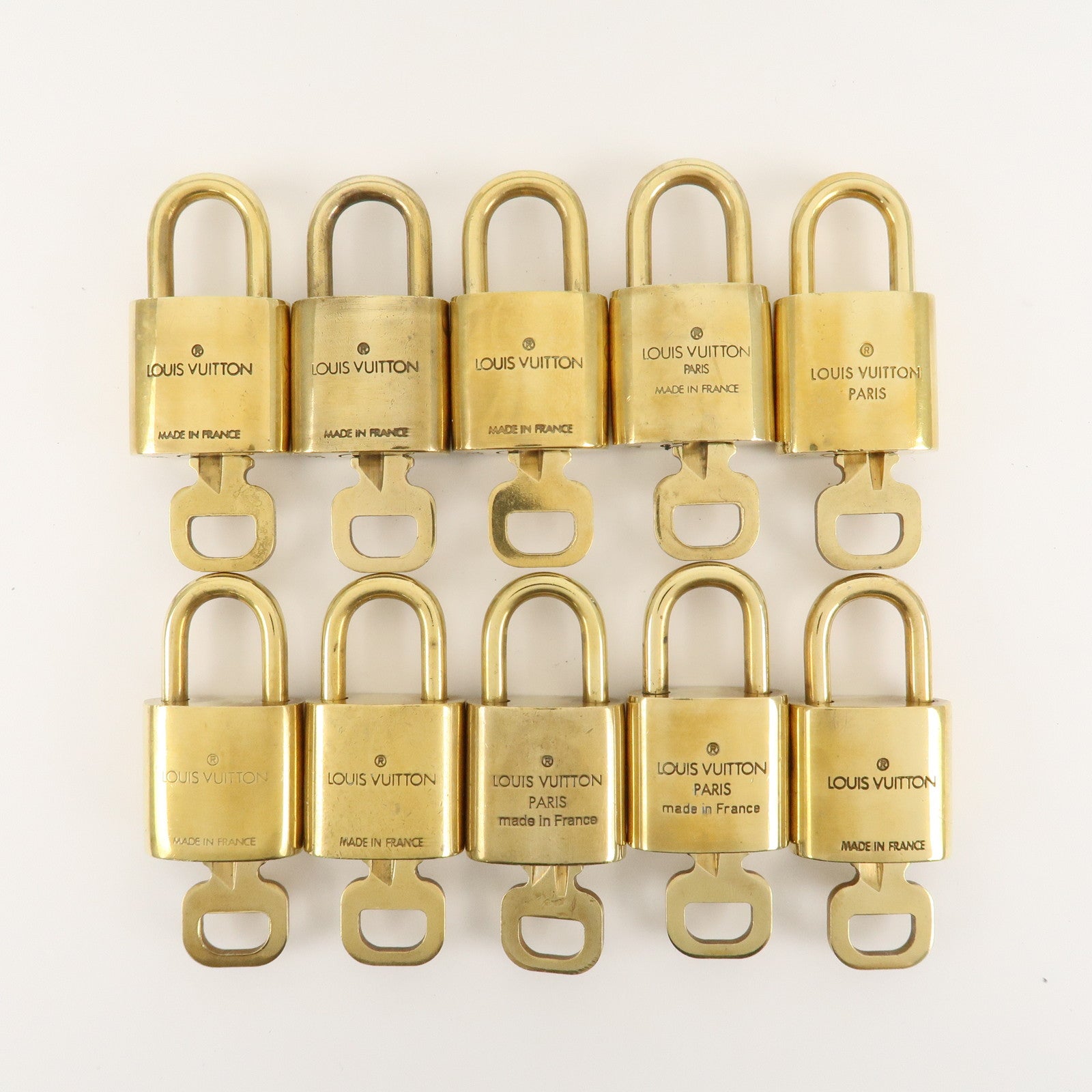 Louis Vuitton Set of 10 Lock 
Key Cadena Key Lock Metal Gold Used