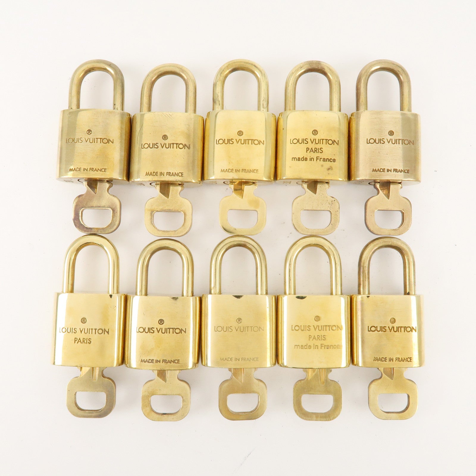 Louis Vuitton Set of 10 Lock 
Key Cadena Key Lock Metal Gold