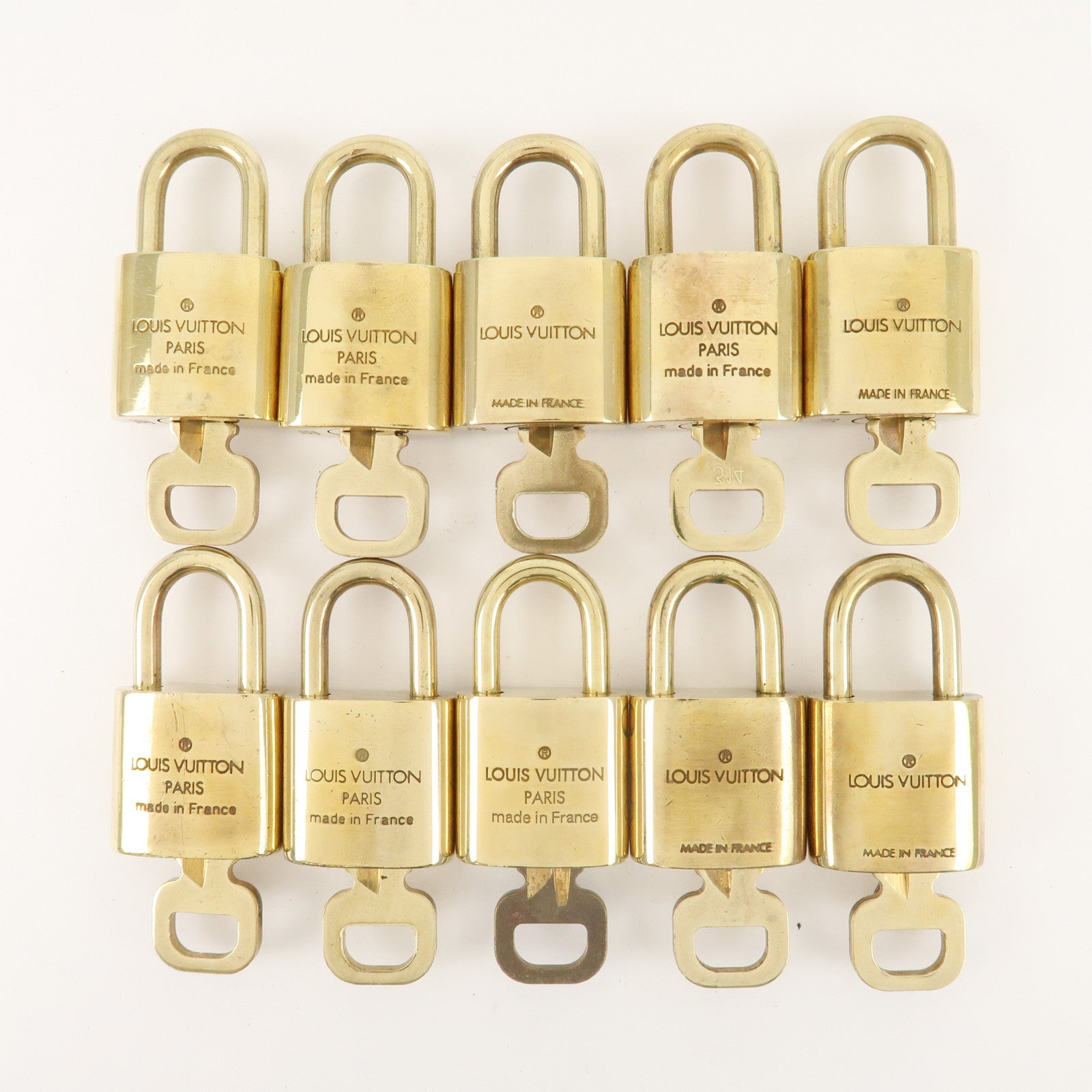 Louis Vuitton Set of 10 Lock 
Key Cadena Key Lock Metal Gold