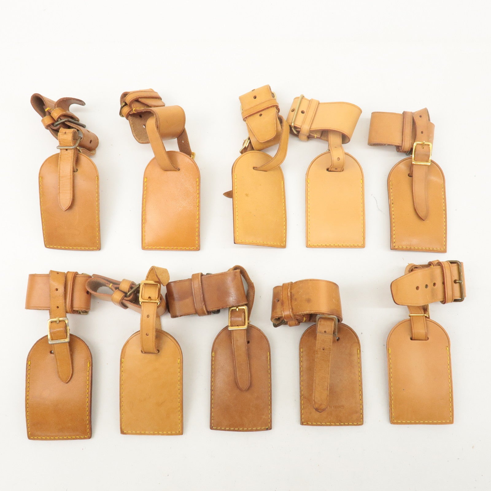 Louis Vuitton Set of 10 Name Tag 
Poignet Leather Natural