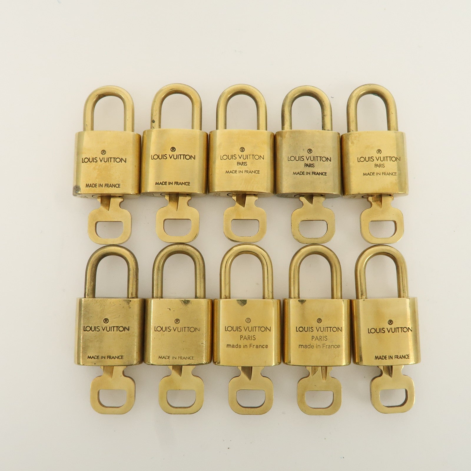 Louis Vuitton Set of 10 Lock 
Key Cadena Key Lock Metal Gold Used