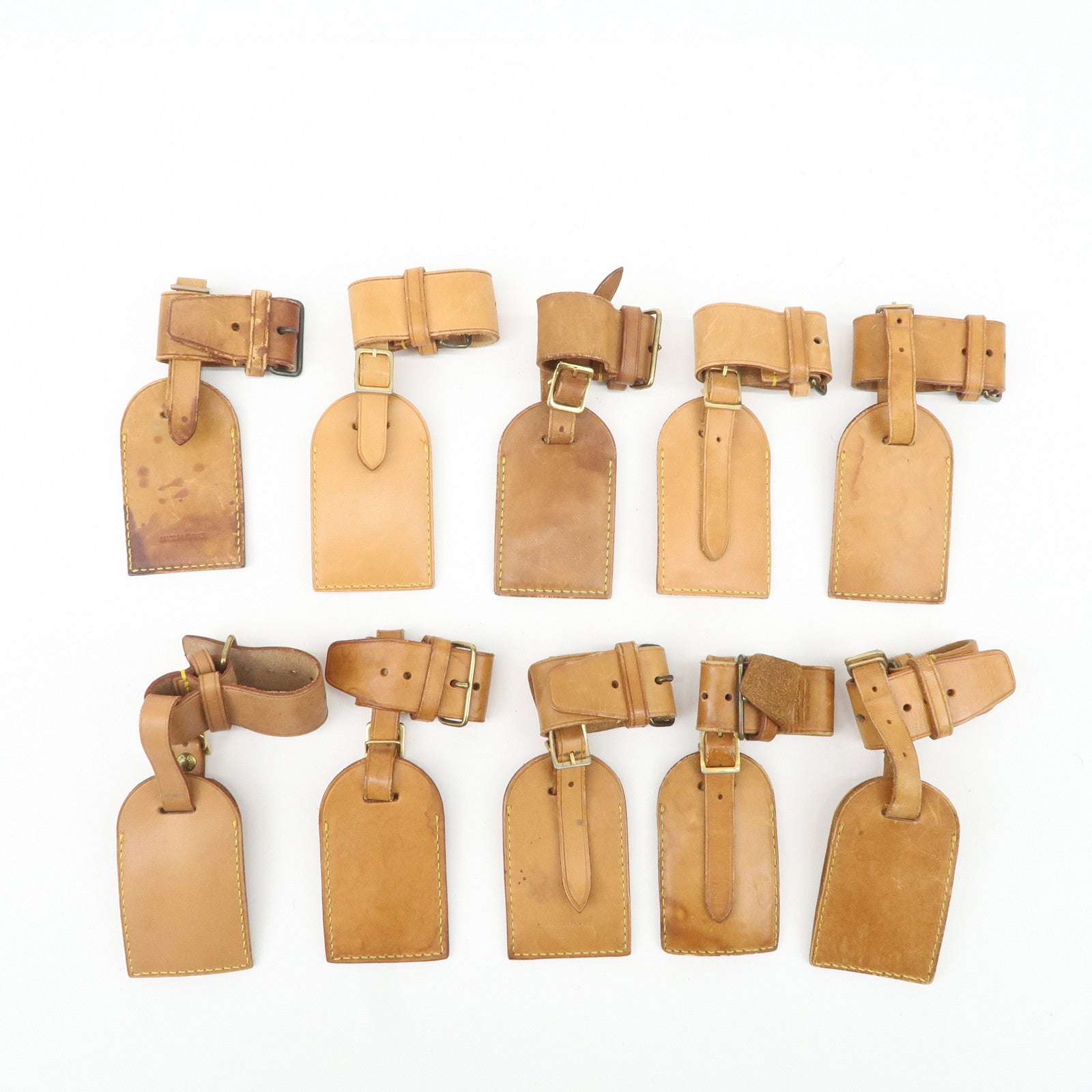 Louis Vuitton Set of 10 Leather Name Tag 
Poignet Natural Used