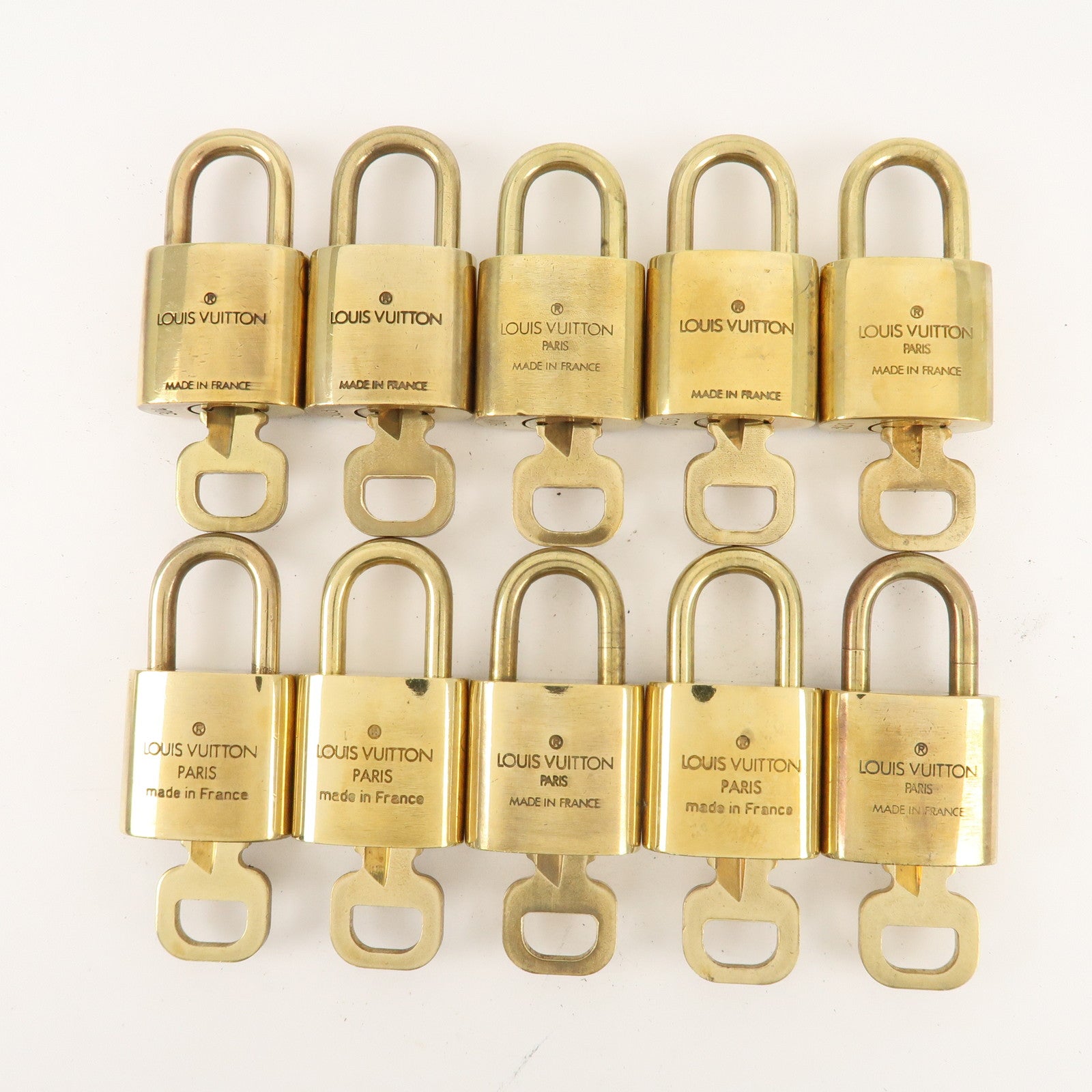 Louis Vuitton Set of 10 Lock 
Key Cadena Key Lock Metal Gold