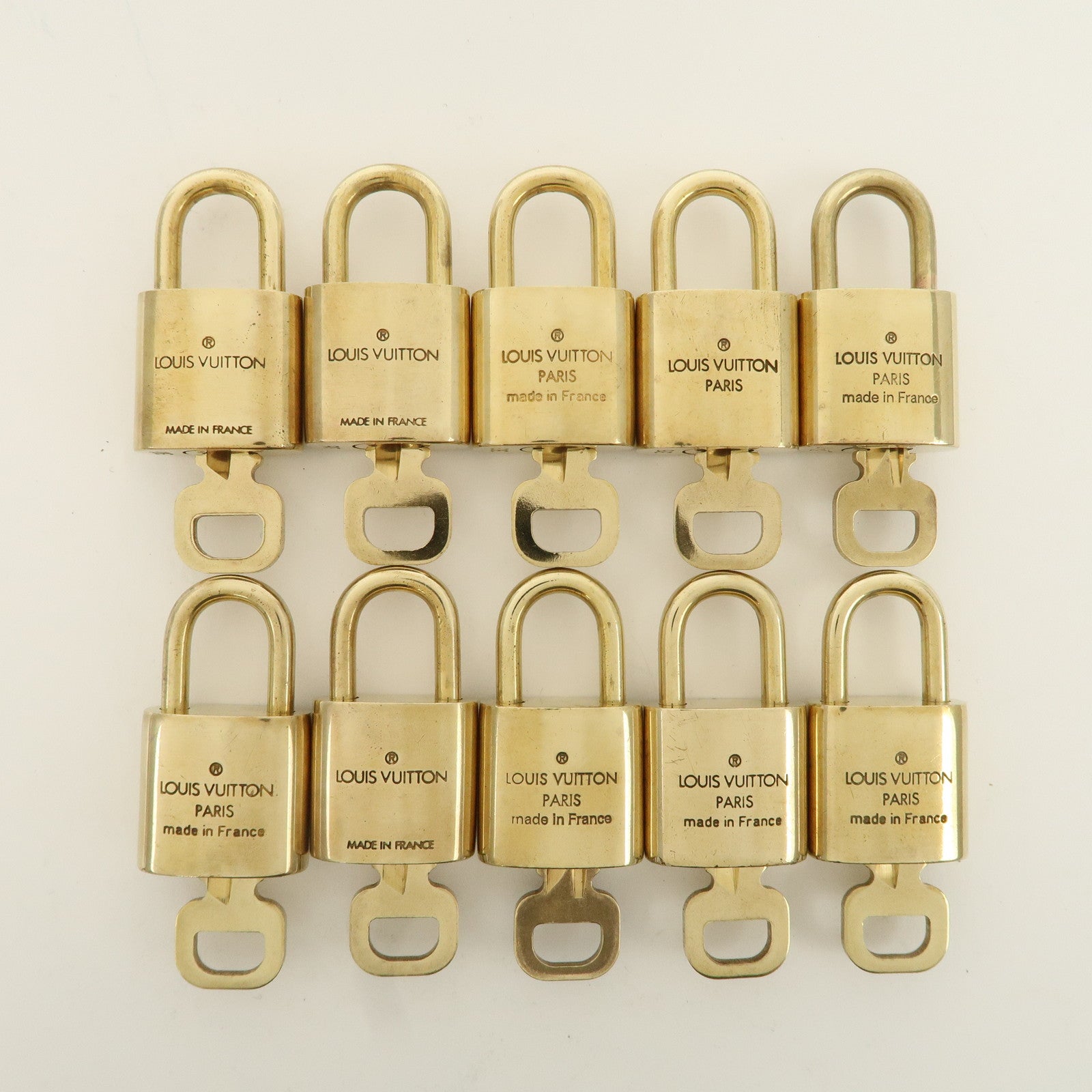 Louis Vuitton Set of 10 Lock 
Key Cadena Key Lock Metal Gold Used