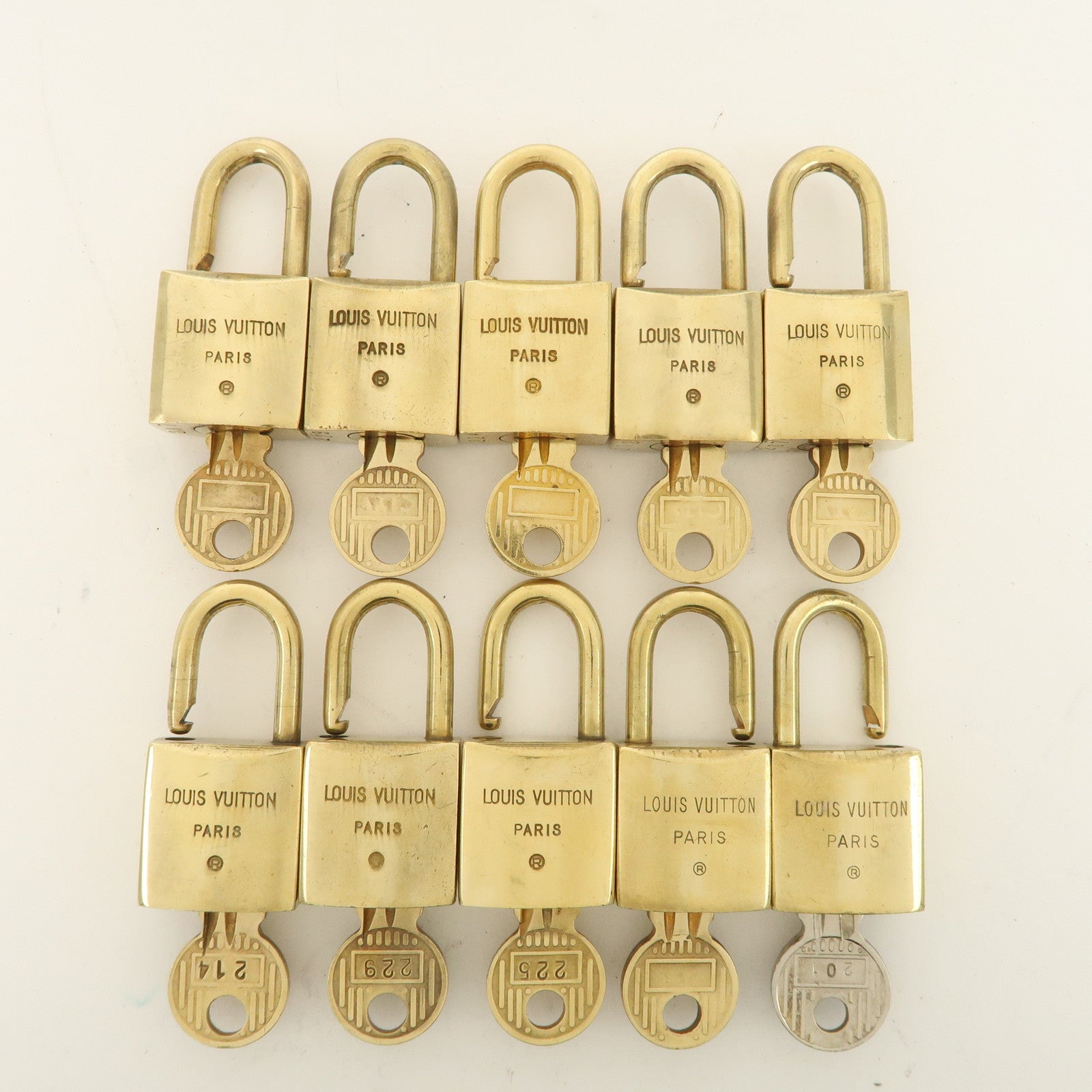 Louis Vuitton Set of 10 Lock 
Key Cadena Key Lock Used