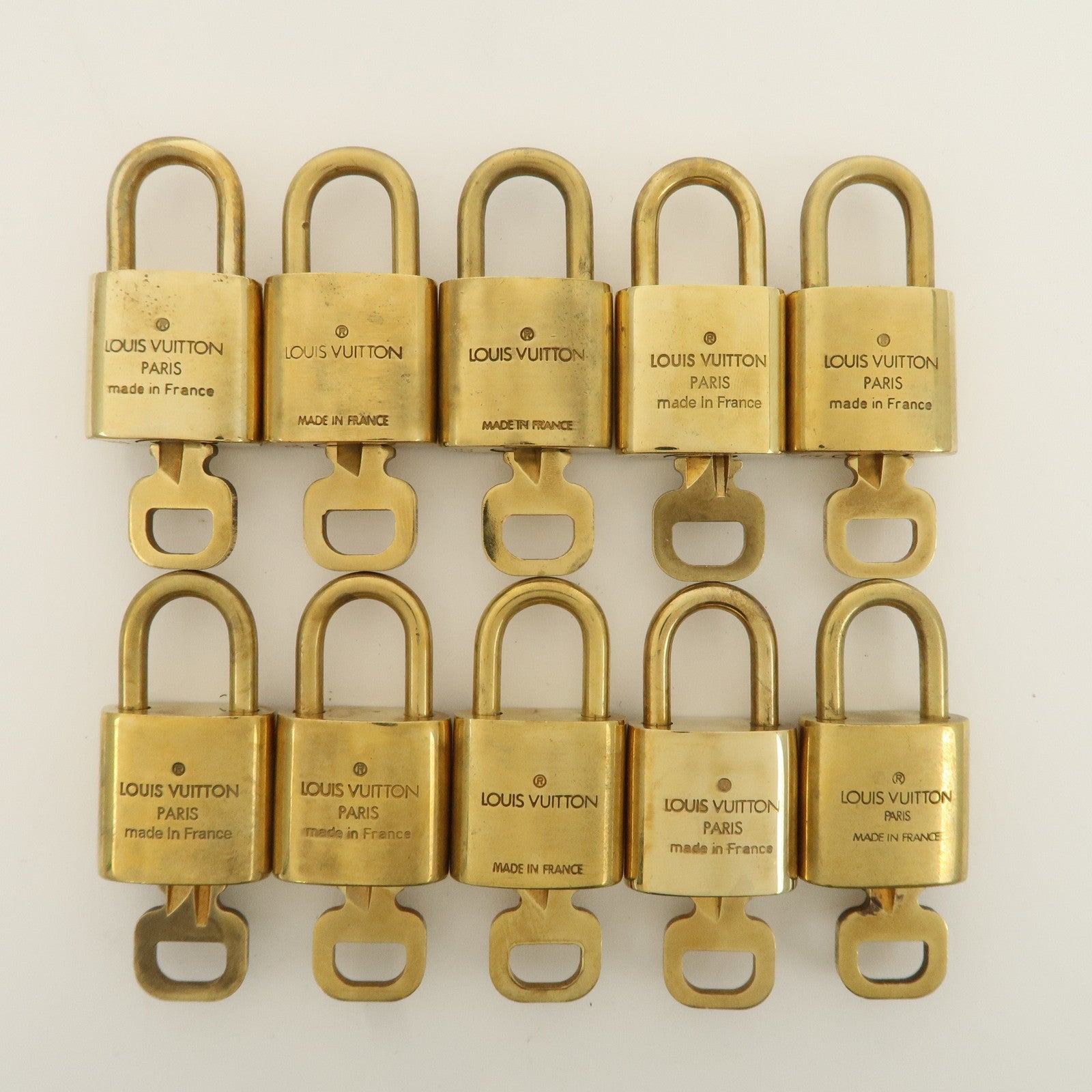 Louis Vuitton Set of 10 Lock 
Key Cadena Key Lock Metal Gold Used