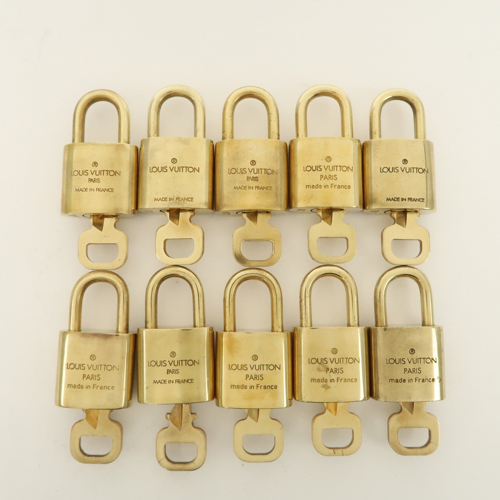 Louis Vuitton Set of 10 Lock 
Key Cadena Key Lock Metal Gold Used