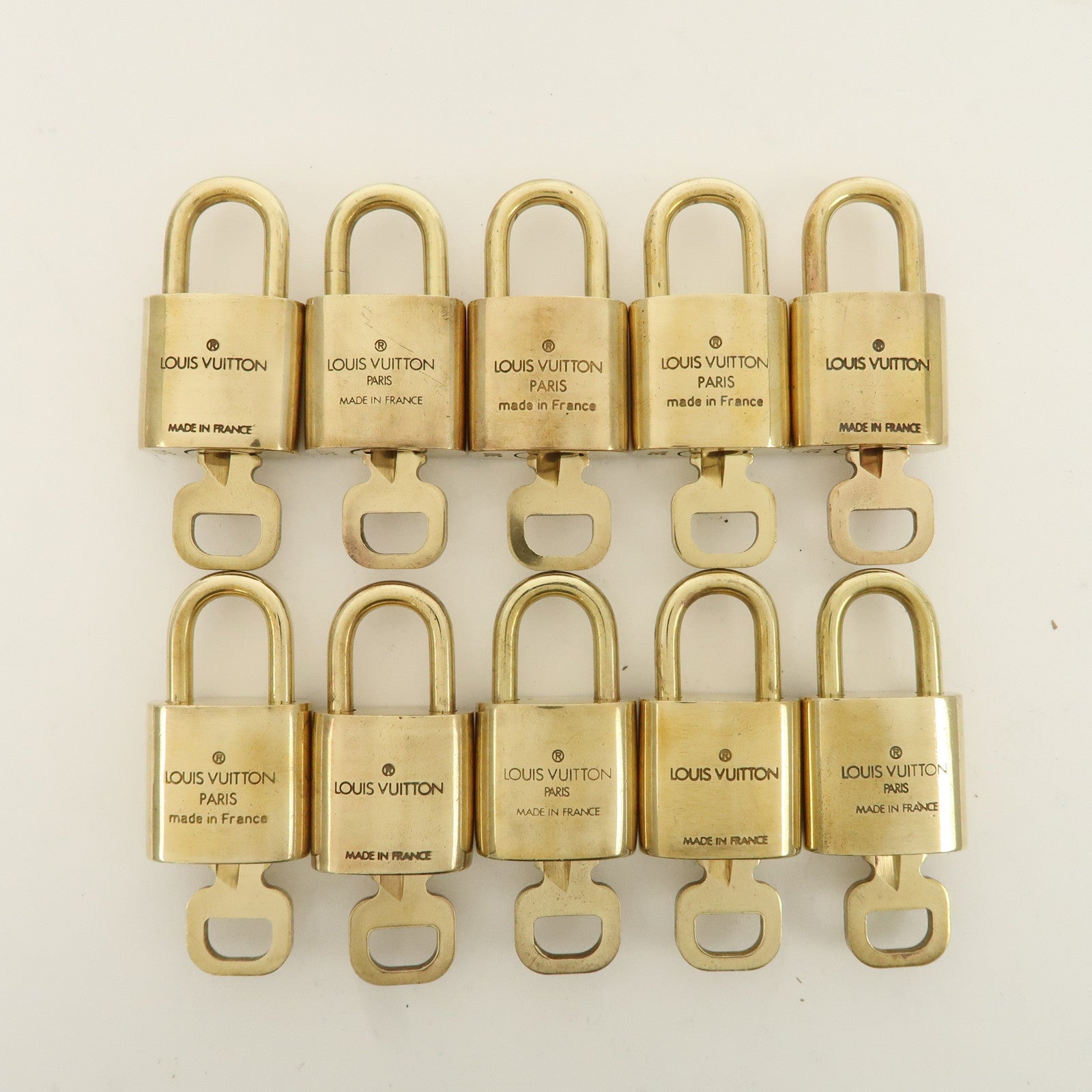 Louis Vuitton Set of 10 Lock 
Key Cadena Key Lock Metal Gold Used