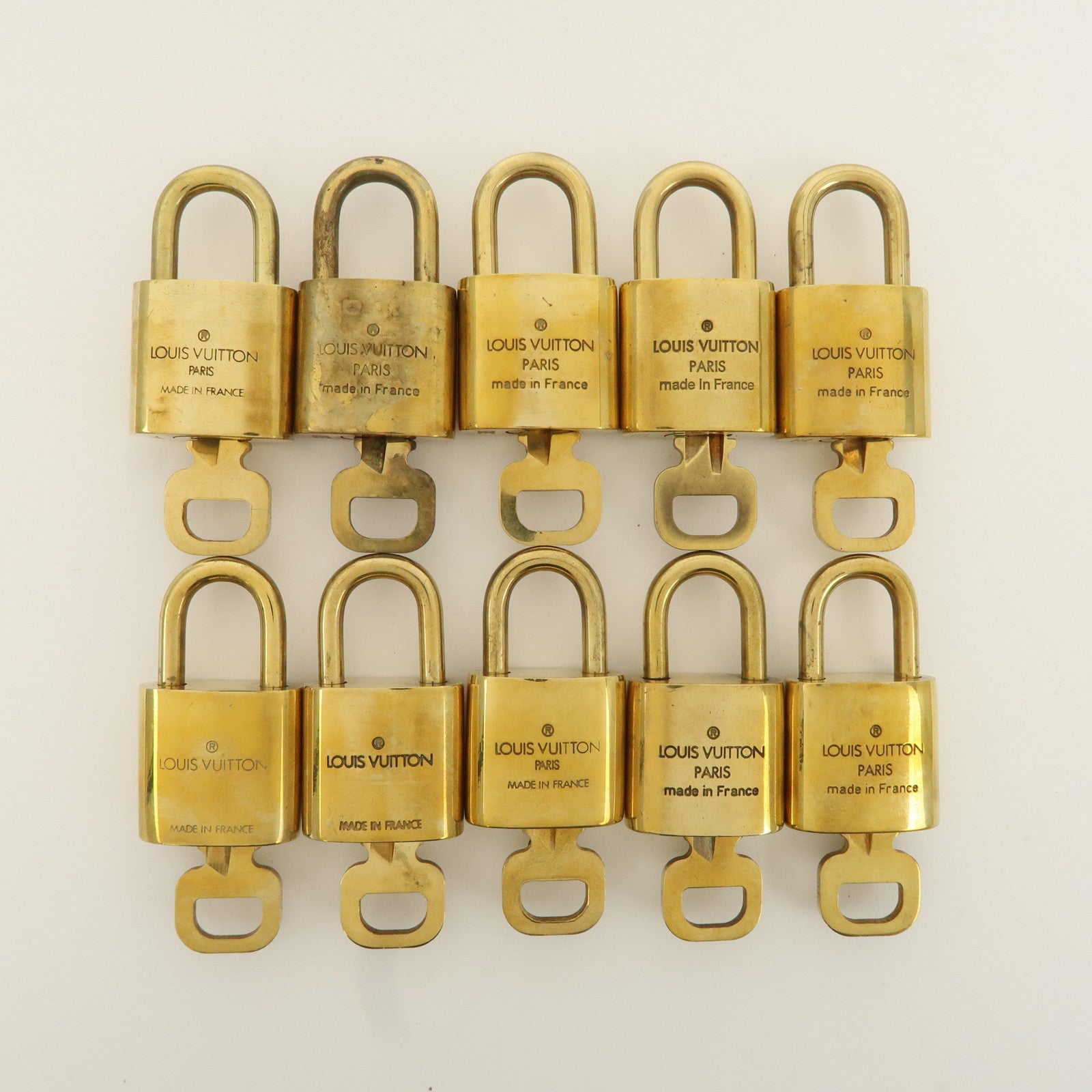 Louis Vuitton Set of 10 Lock 
Key Cadena Key Lock Metal Gold Used