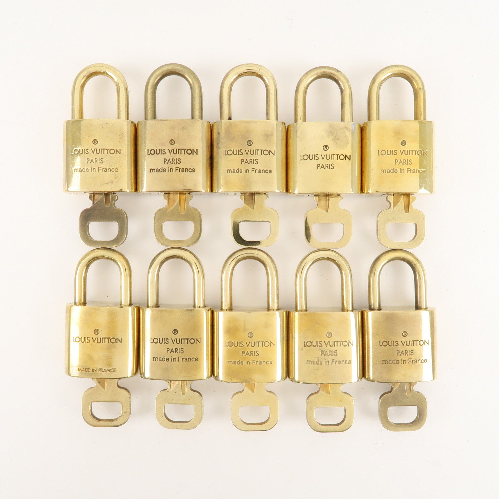 Louis Vuitton Set of 10 Lock 
Key Cadena Key Lock Metal Gold