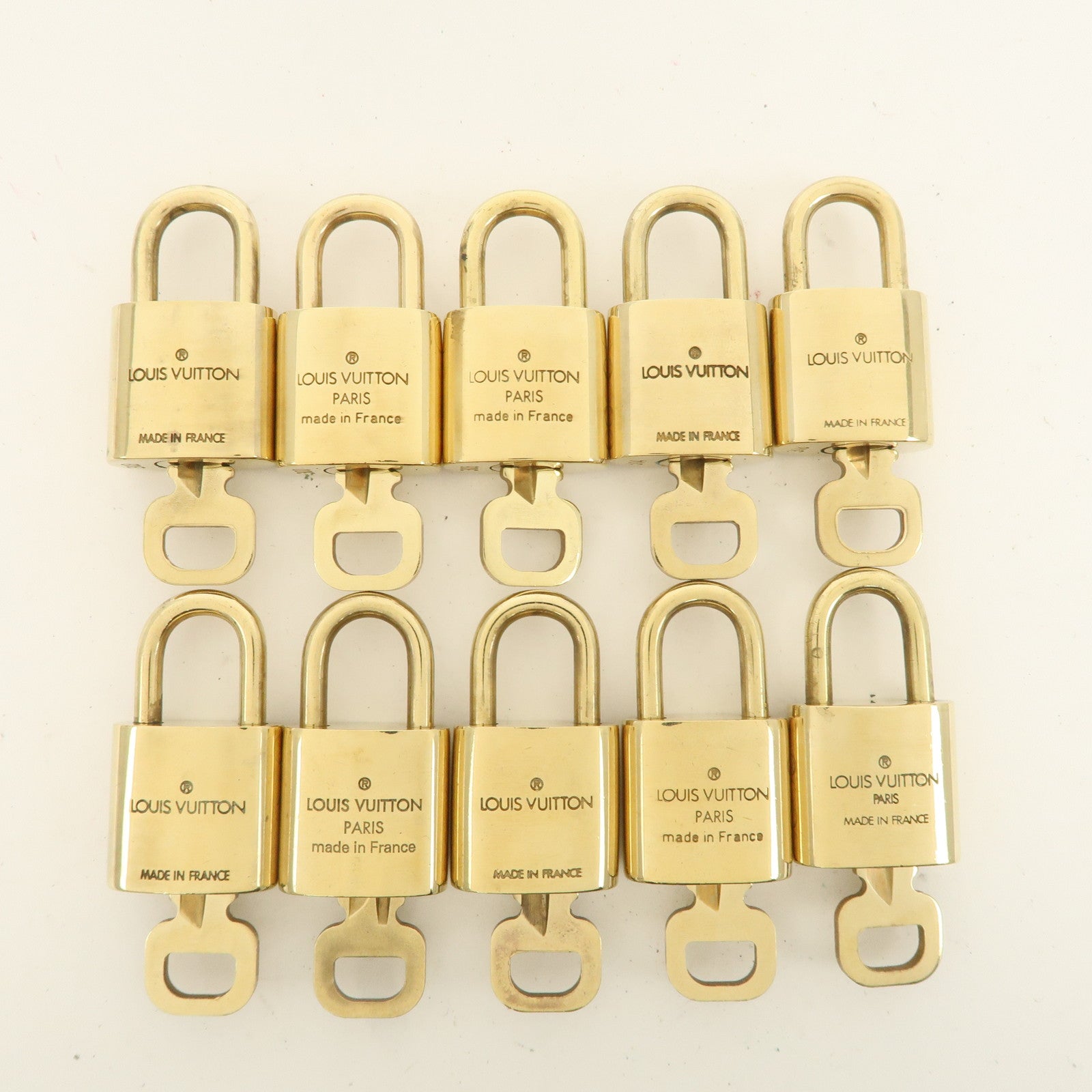 Louis Vuitton Set of 10 Lock 
Key Cadena Key Lock Metal Gold Used