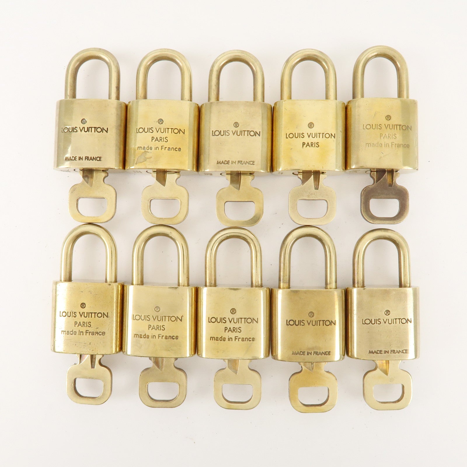 Louis Vuitton Set of 10 Lock 
Key Cadena Key Lock Metal Gold