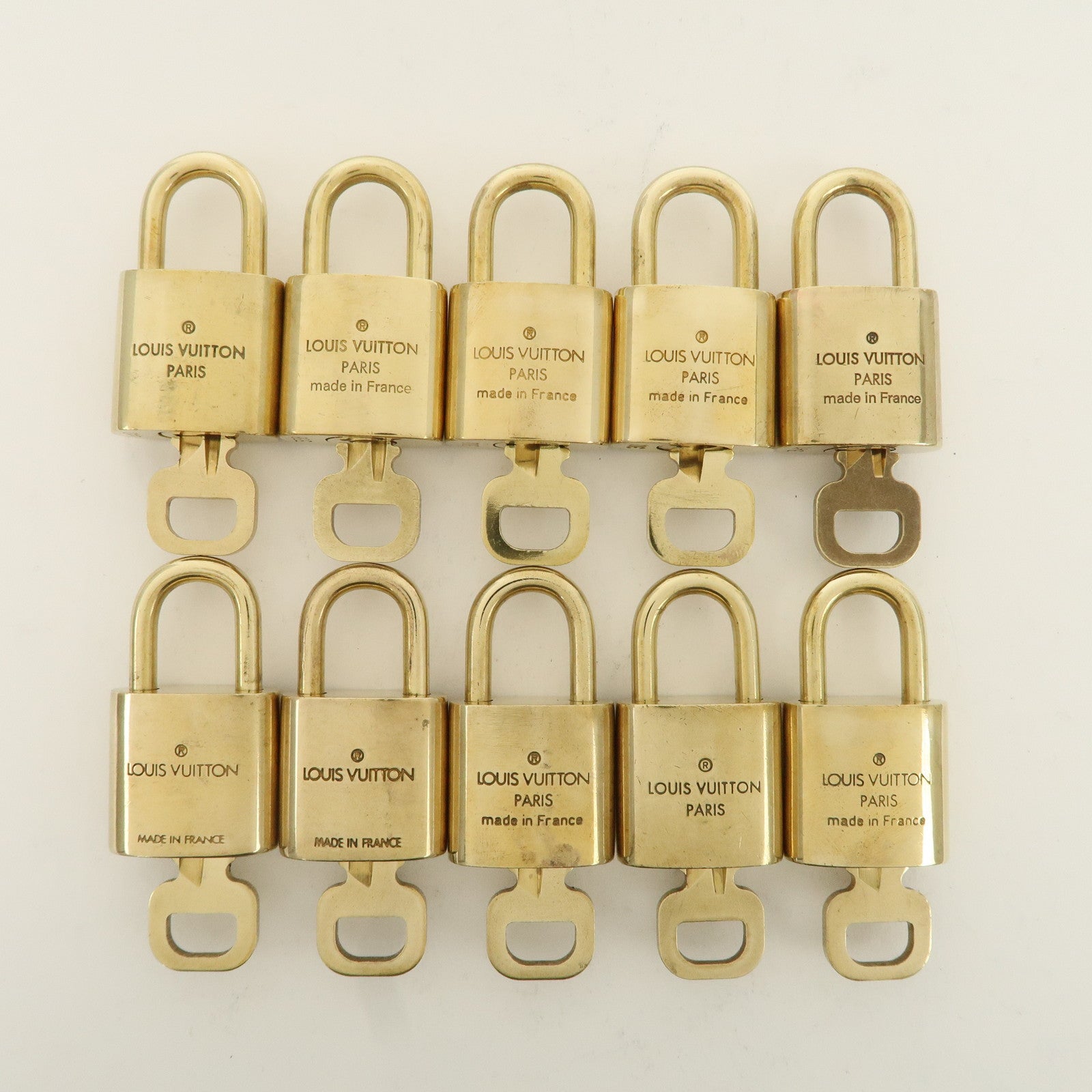 Louis Vuitton Set of 10 Lock 
Key Cadena Key Lock Metal Gold Used