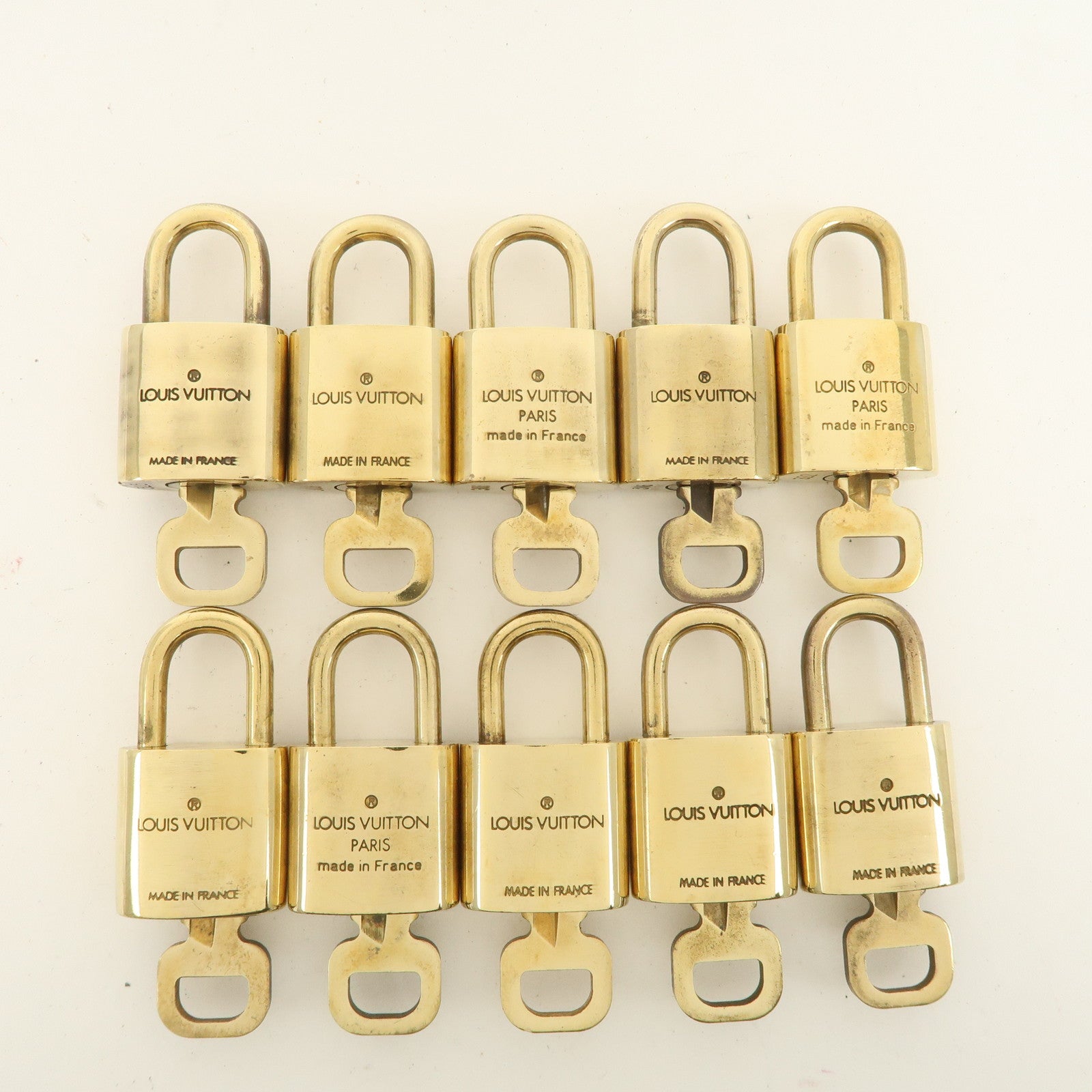 Louis Vuitton Set of 10 Lock 
Key Cadena Key Lock Metal Gold Used