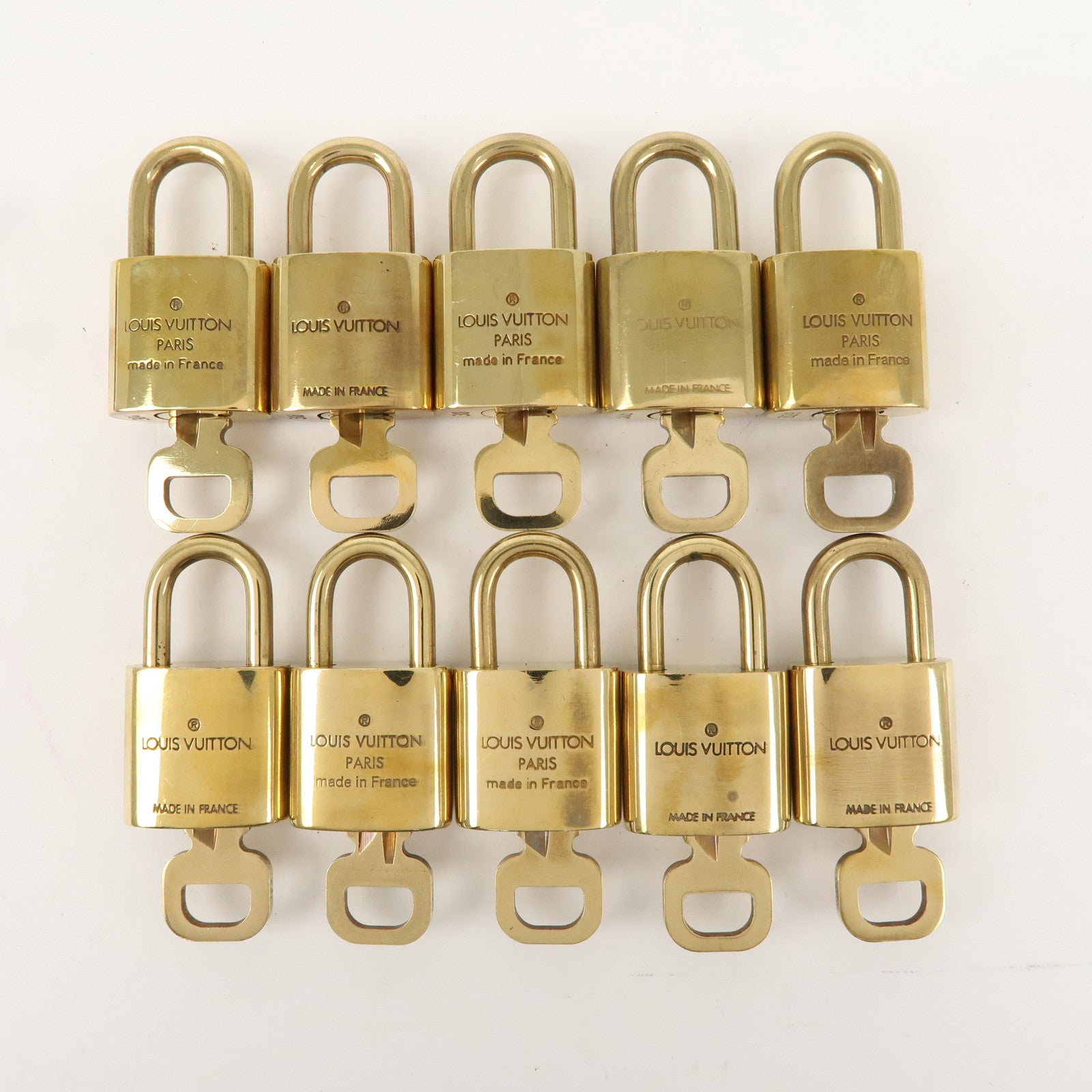 Louis Vuitton Set of 10 Lock 
Key Cadena Key Lock Gold