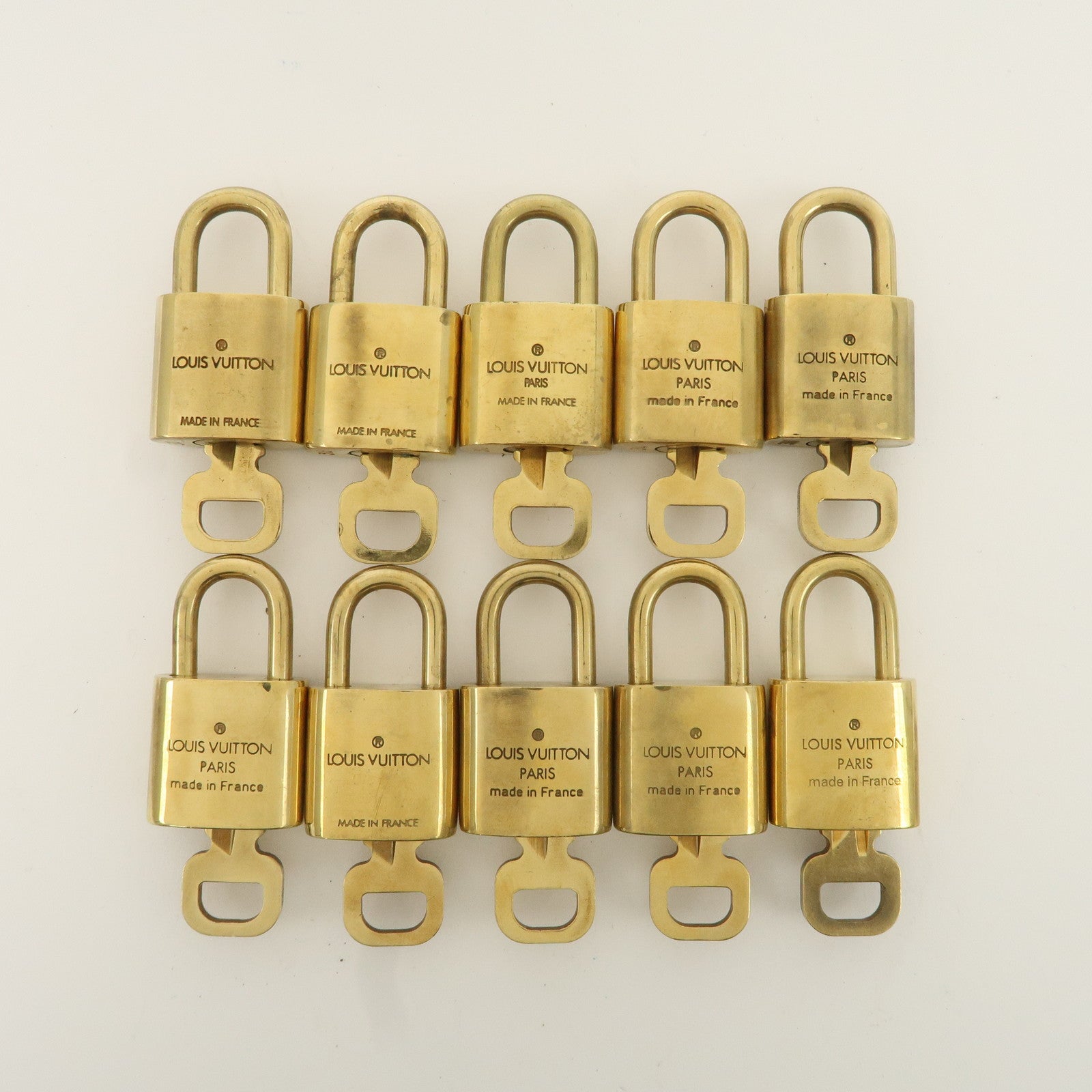 Louis Vuitton Set of 10 Lock 
Key Cadena Key Lock Metal Gold Used