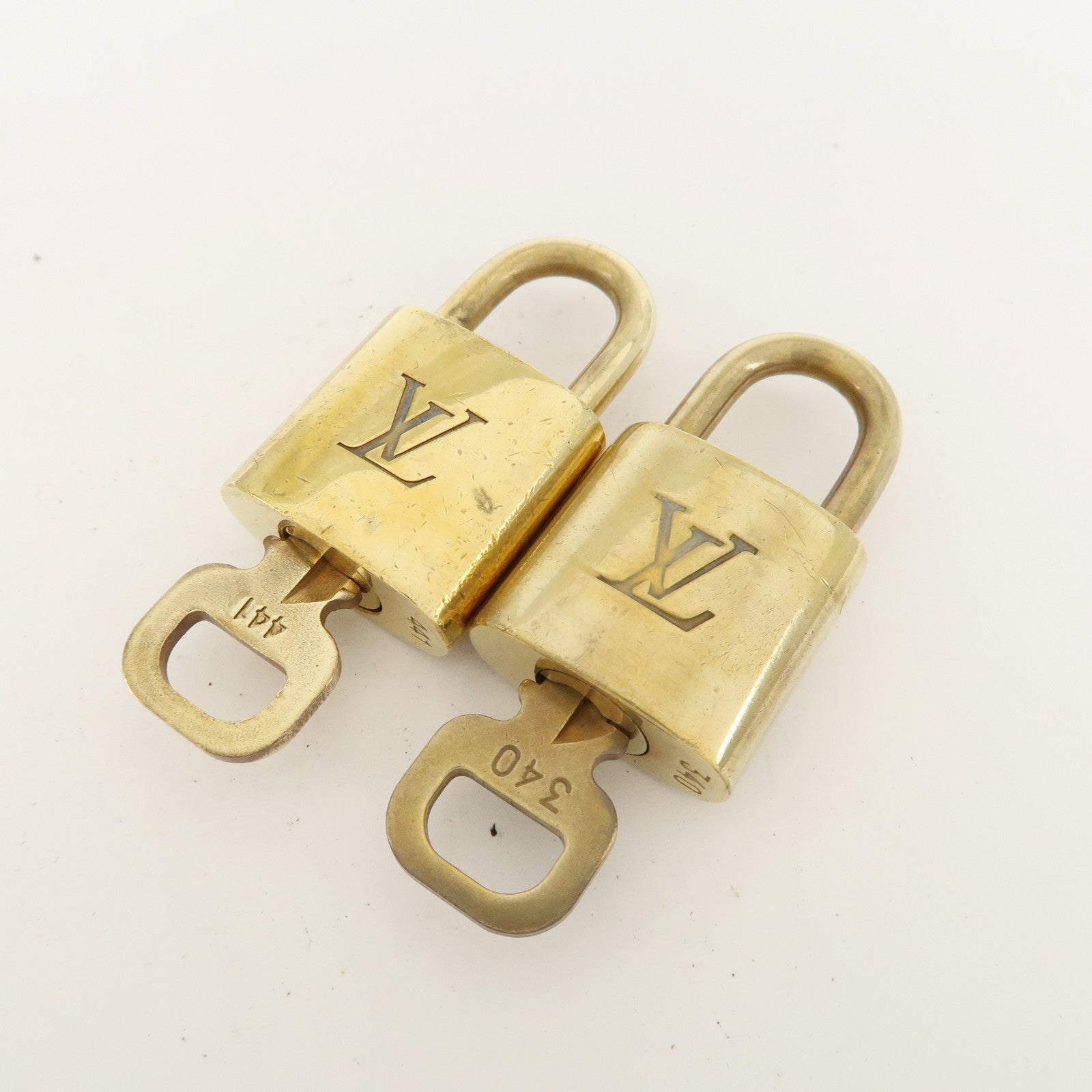 Louis Vuitton Set of 10 Lock 
Key Cadena Key Lock Metal Gold