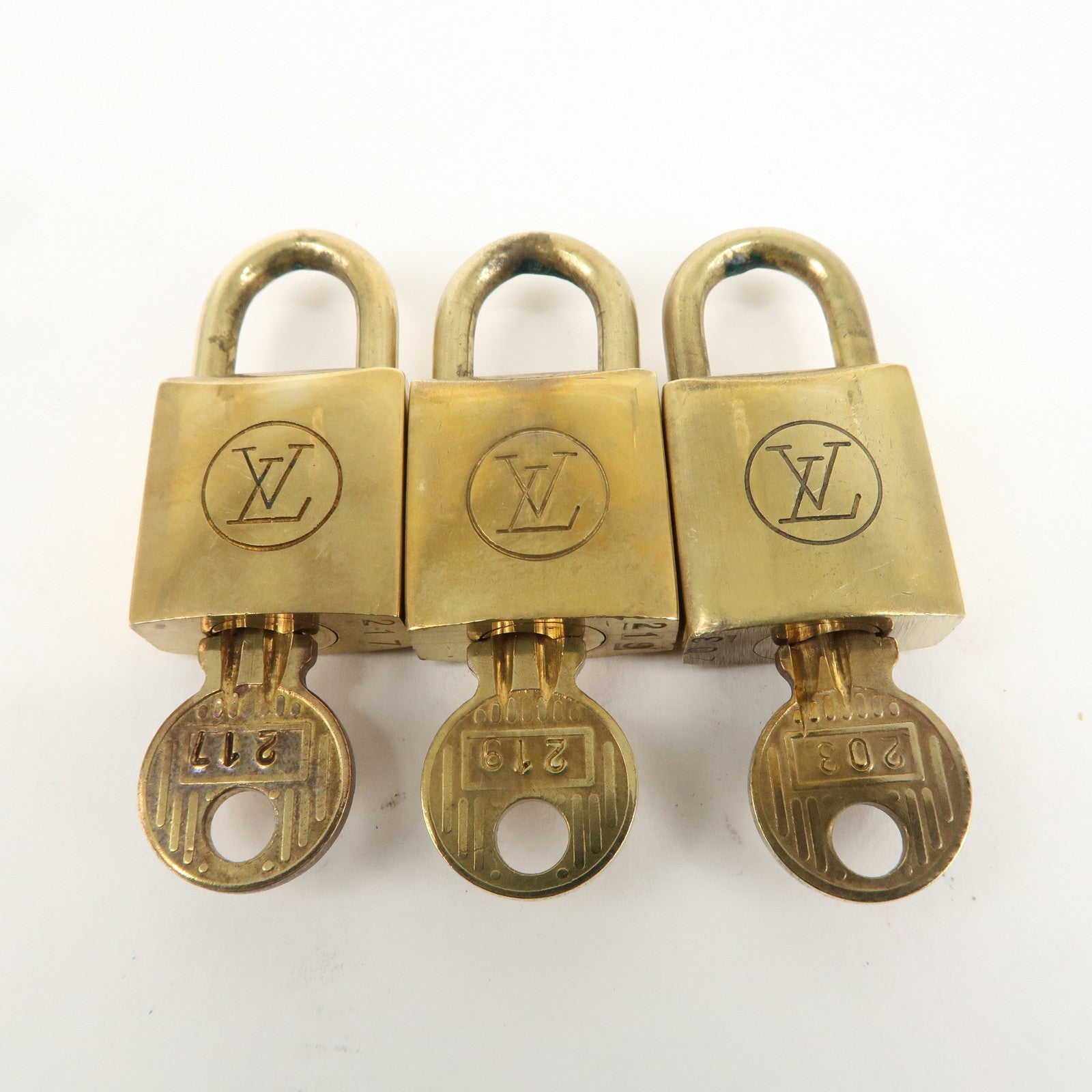 Louis Vuitton Set of 10 Lock 
Key Cadena Key Lock Gold