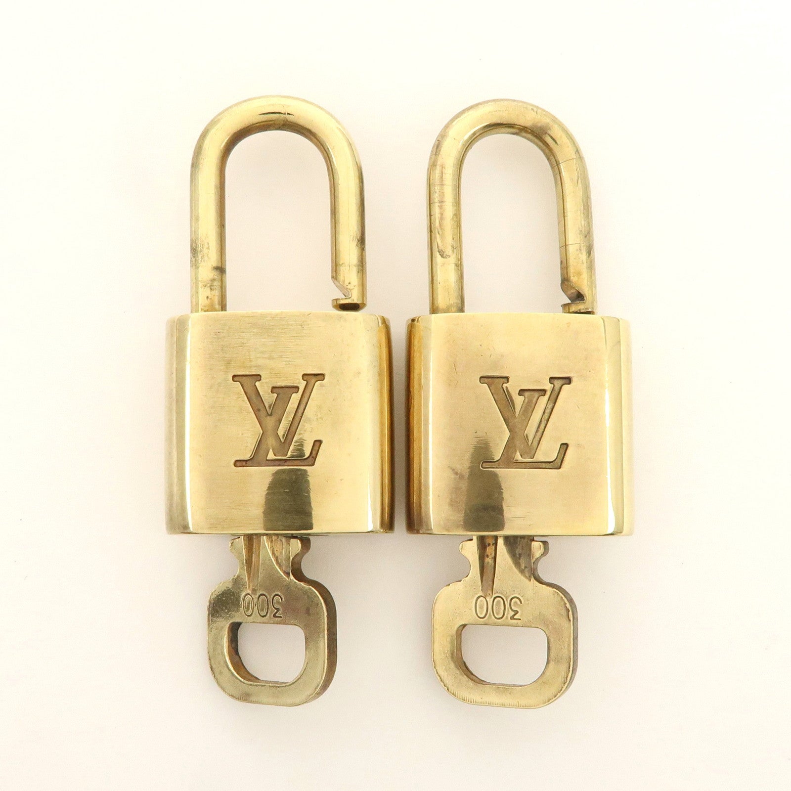 Louis Vuitton Set of 10 Lock 
Key Cadena Key Lock