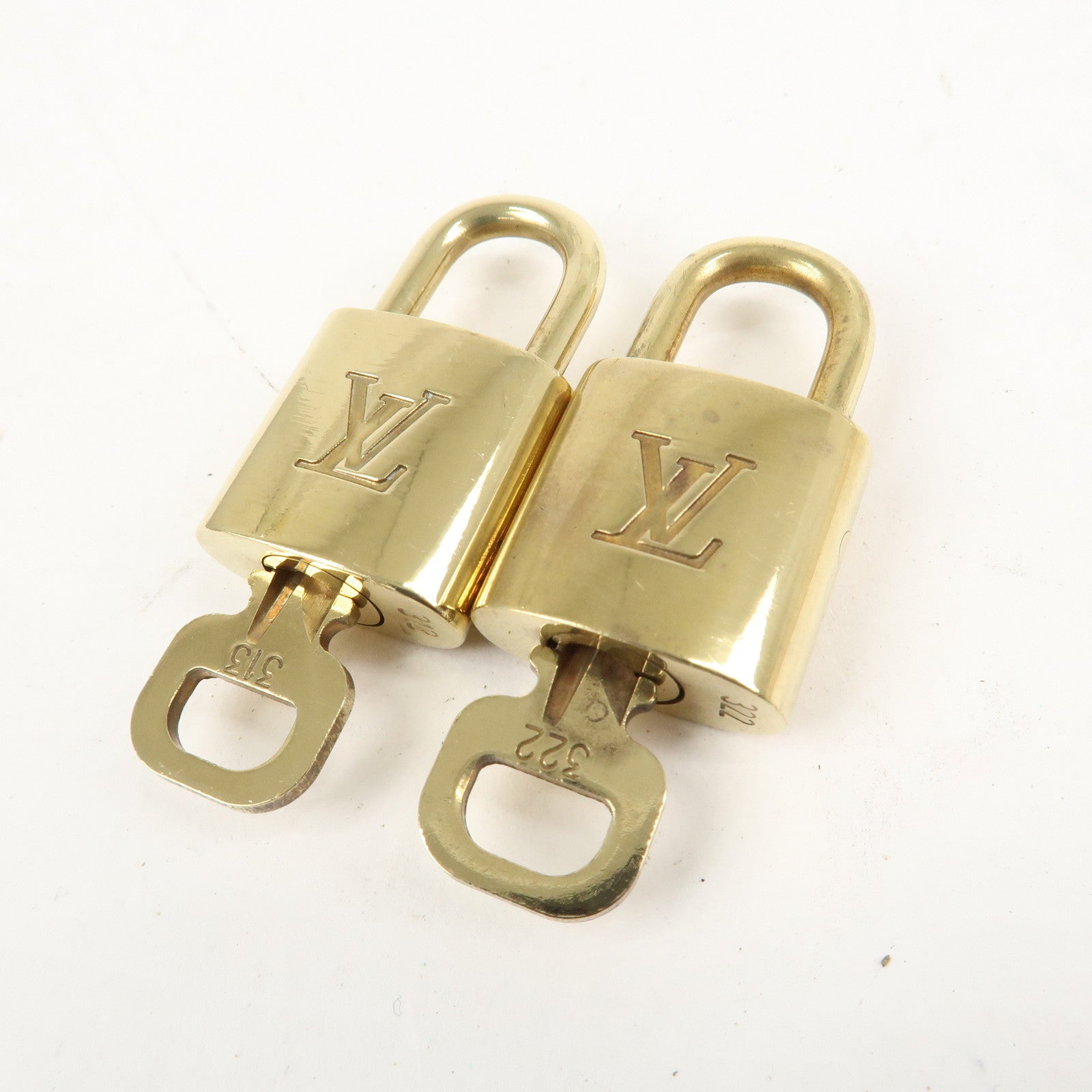 Louis Vuitton Set of 10 Lock 
Key Cadena Key Lock Metal Gold Used