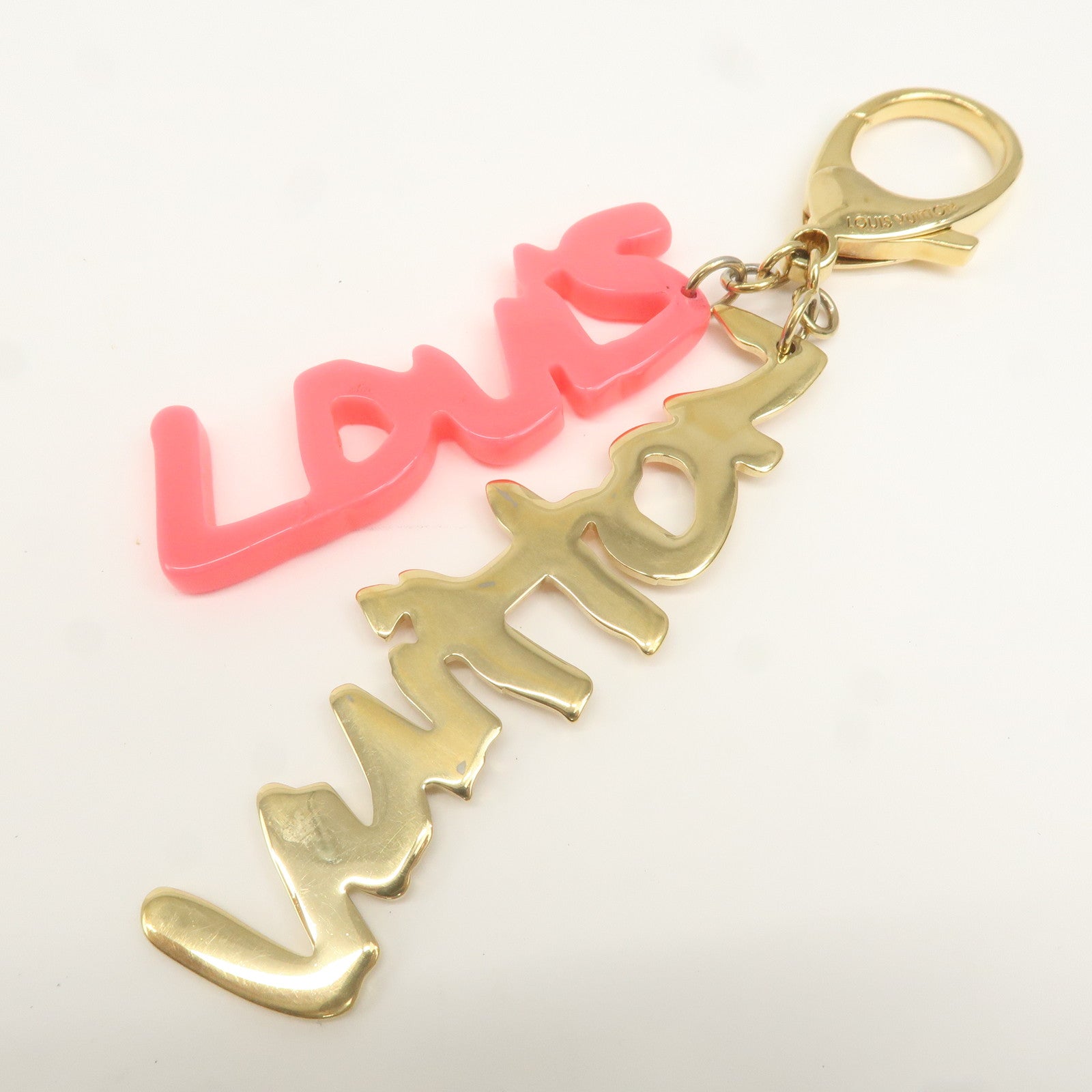 Louis Vuitton Bijou Sac Graffiti Bag Charm Gold Pink M65765