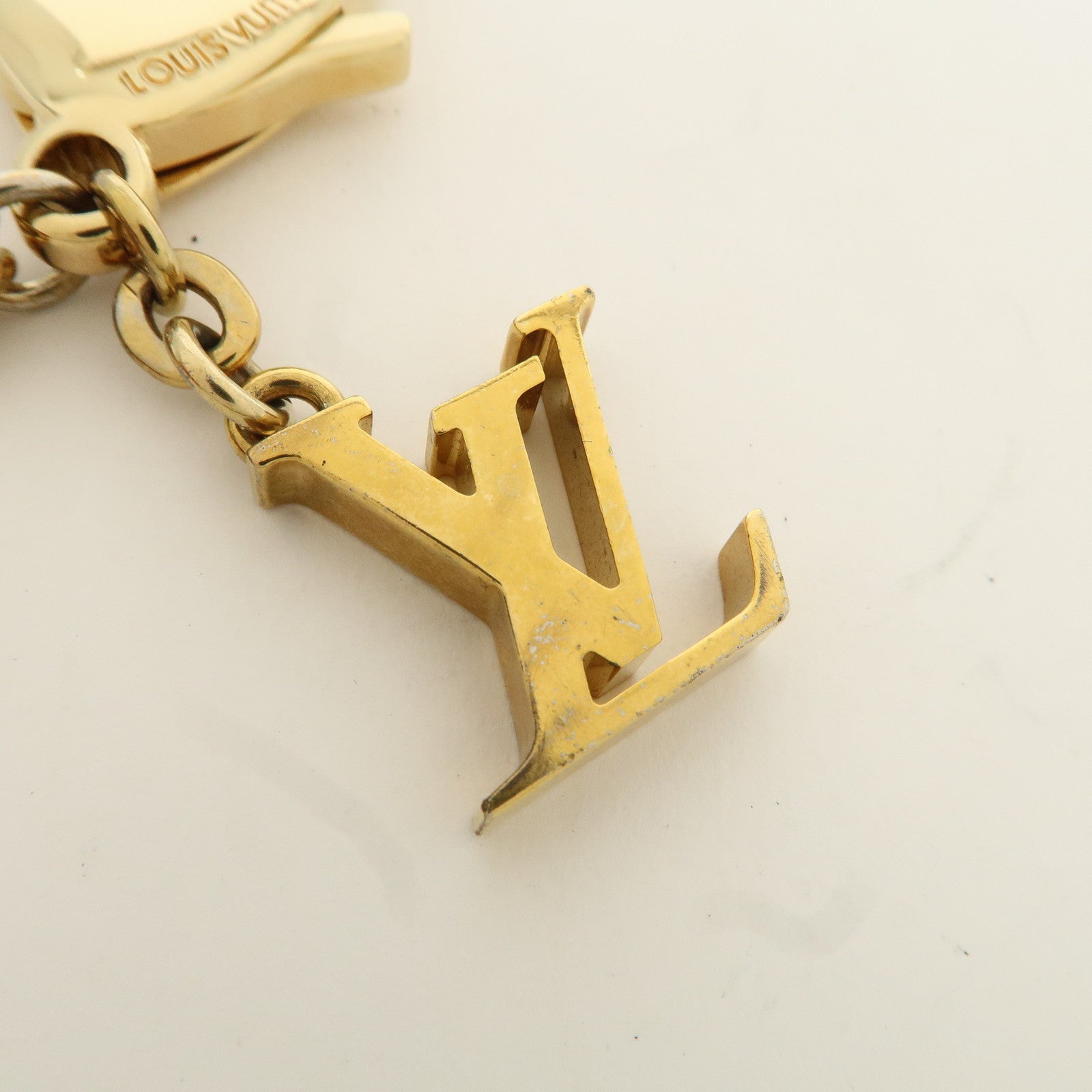 Louis Vuitton Hollow Flower Bag Charm Gold Pink M66975 Used