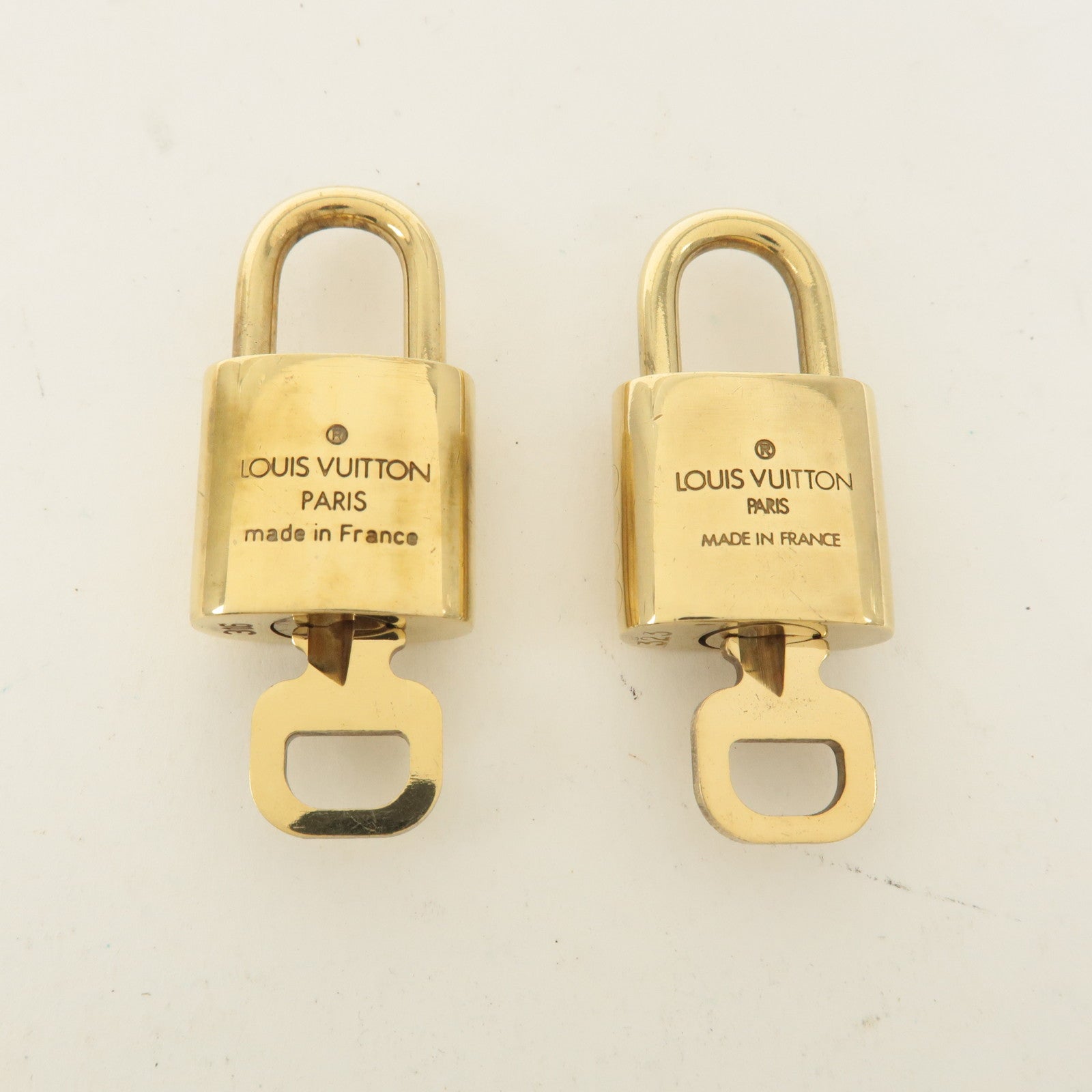 Louis Vuitton Set of 10 Lock 
Key Cadena Key Lock Gold