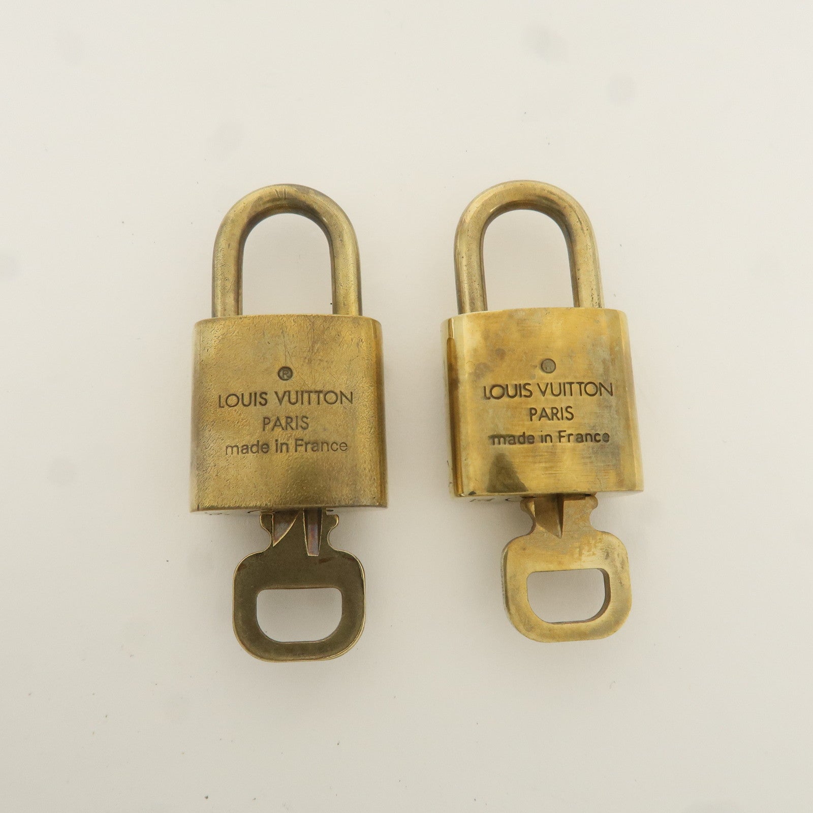 Louis Vuitton Set of 10 Lock 
Key Cadena Key Lock Gold