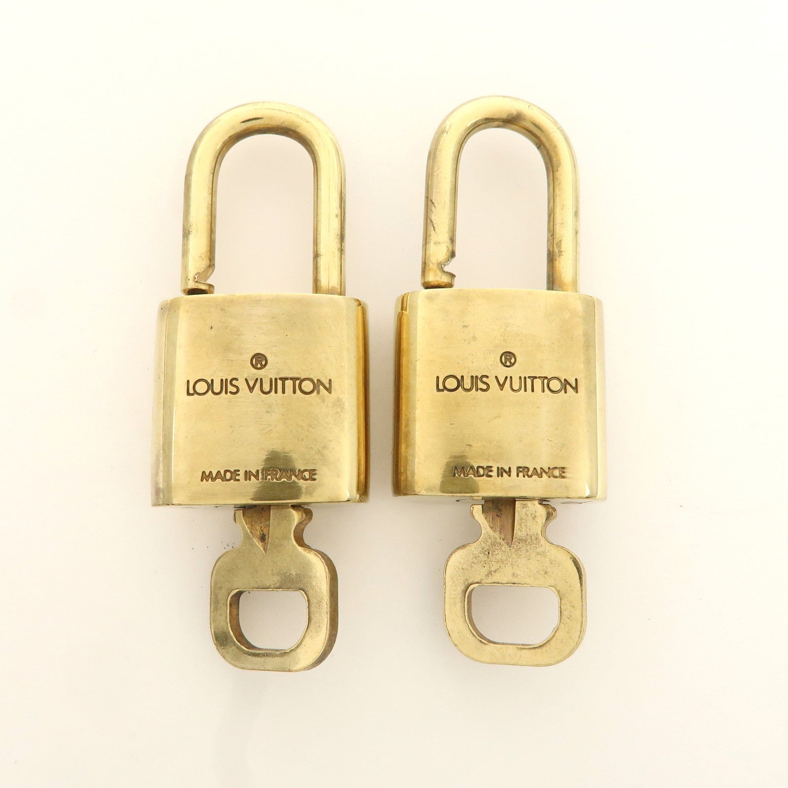 Louis Vuitton Set of 10 Lock 
Key Cadena Key Lock