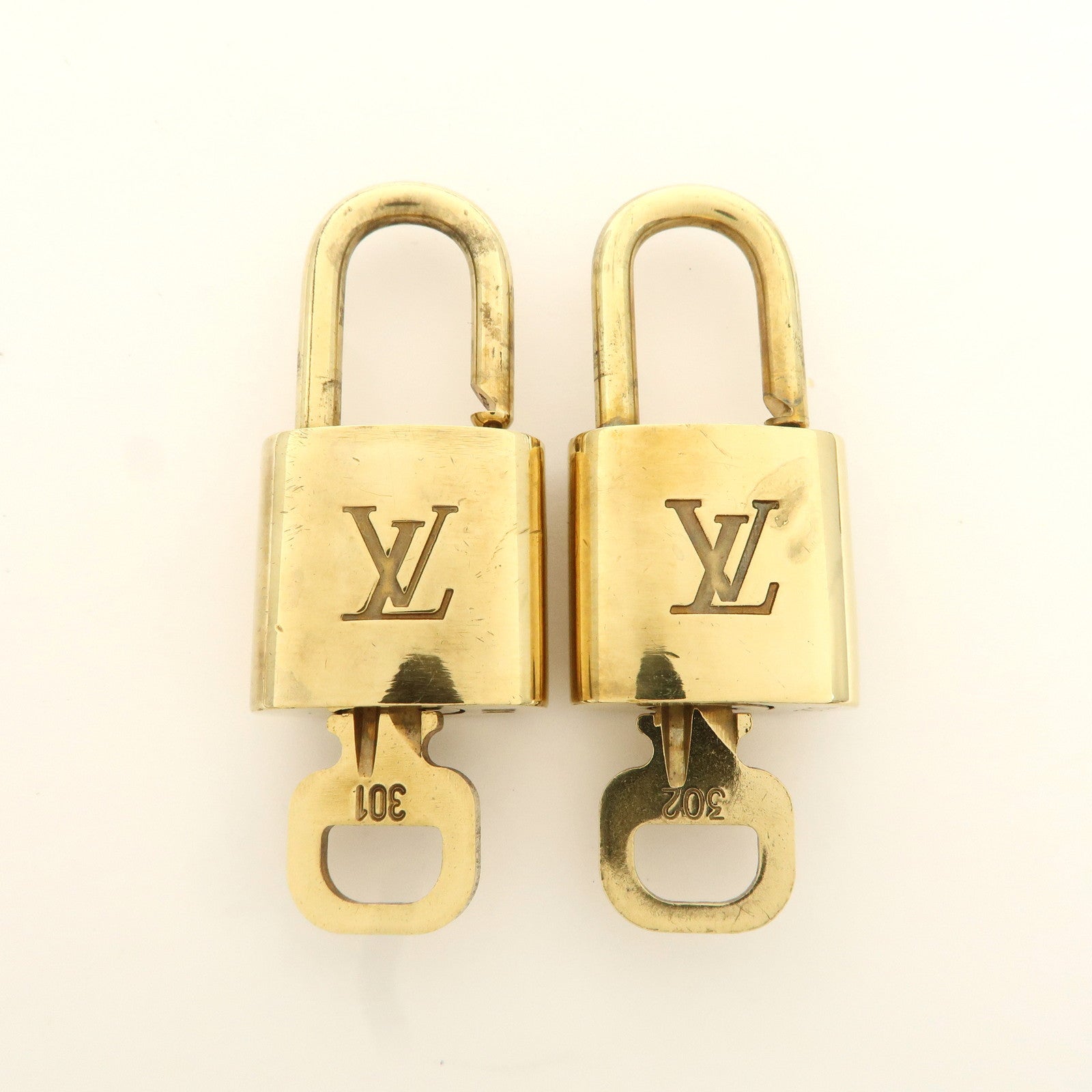 Louis Vuitton Set of 10 Lock 
Key Cadena Key Lock