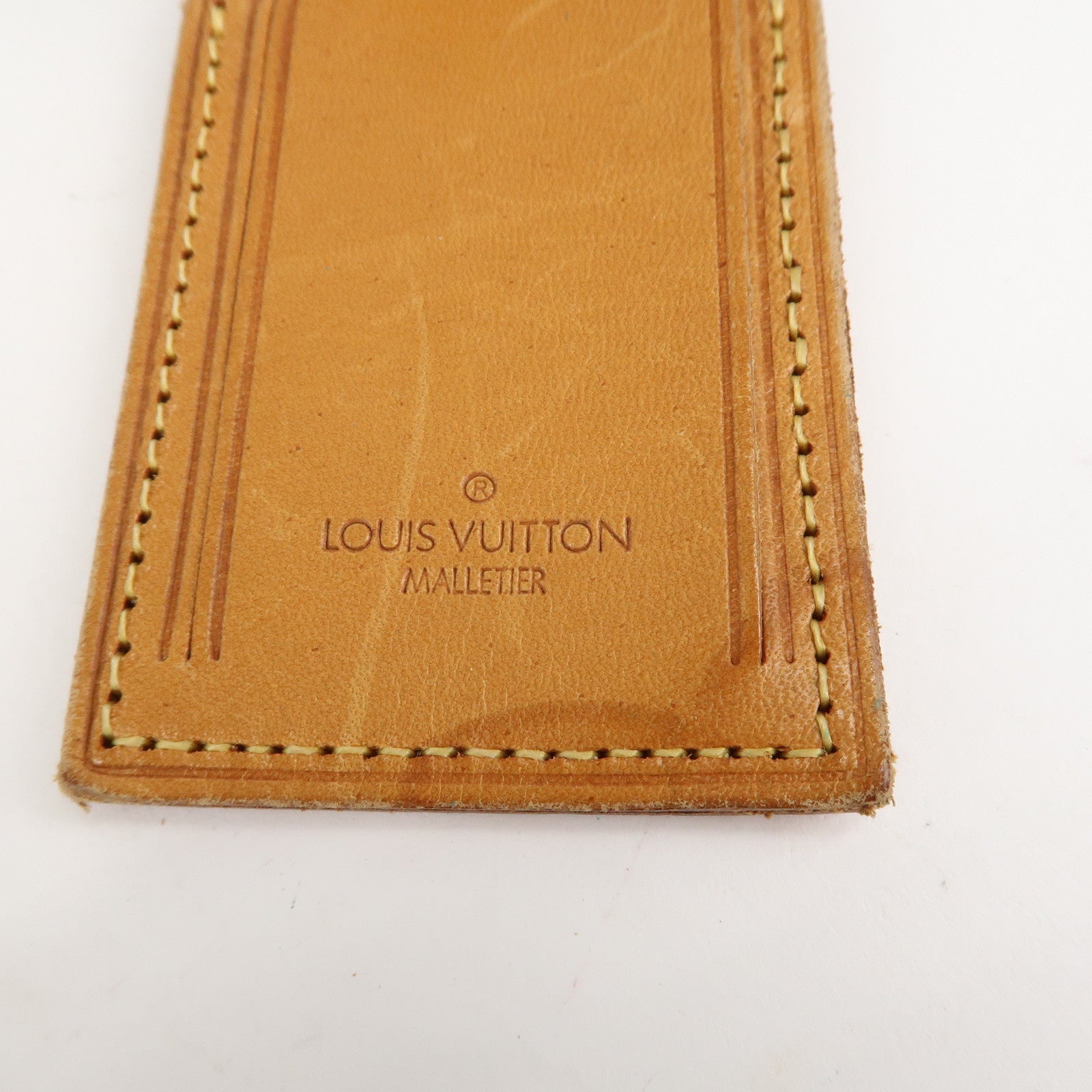 Louis Vuitton Set of 10 Leather Name Tag 
Poignet Natural Used