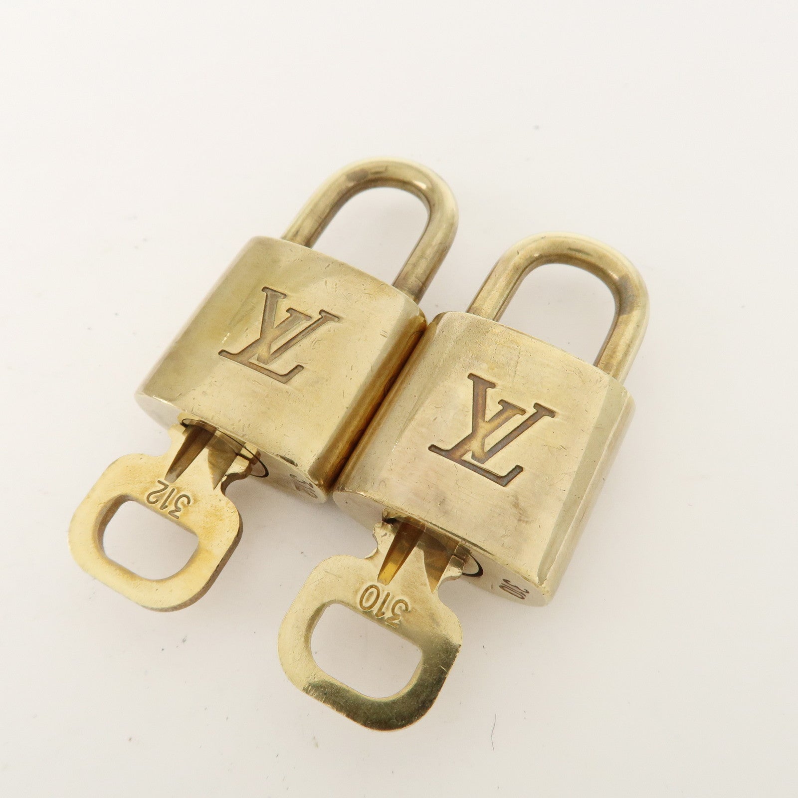 Louis Vuitton Set of 10 Lock 
Key Cadena Key Lock Metal Gold