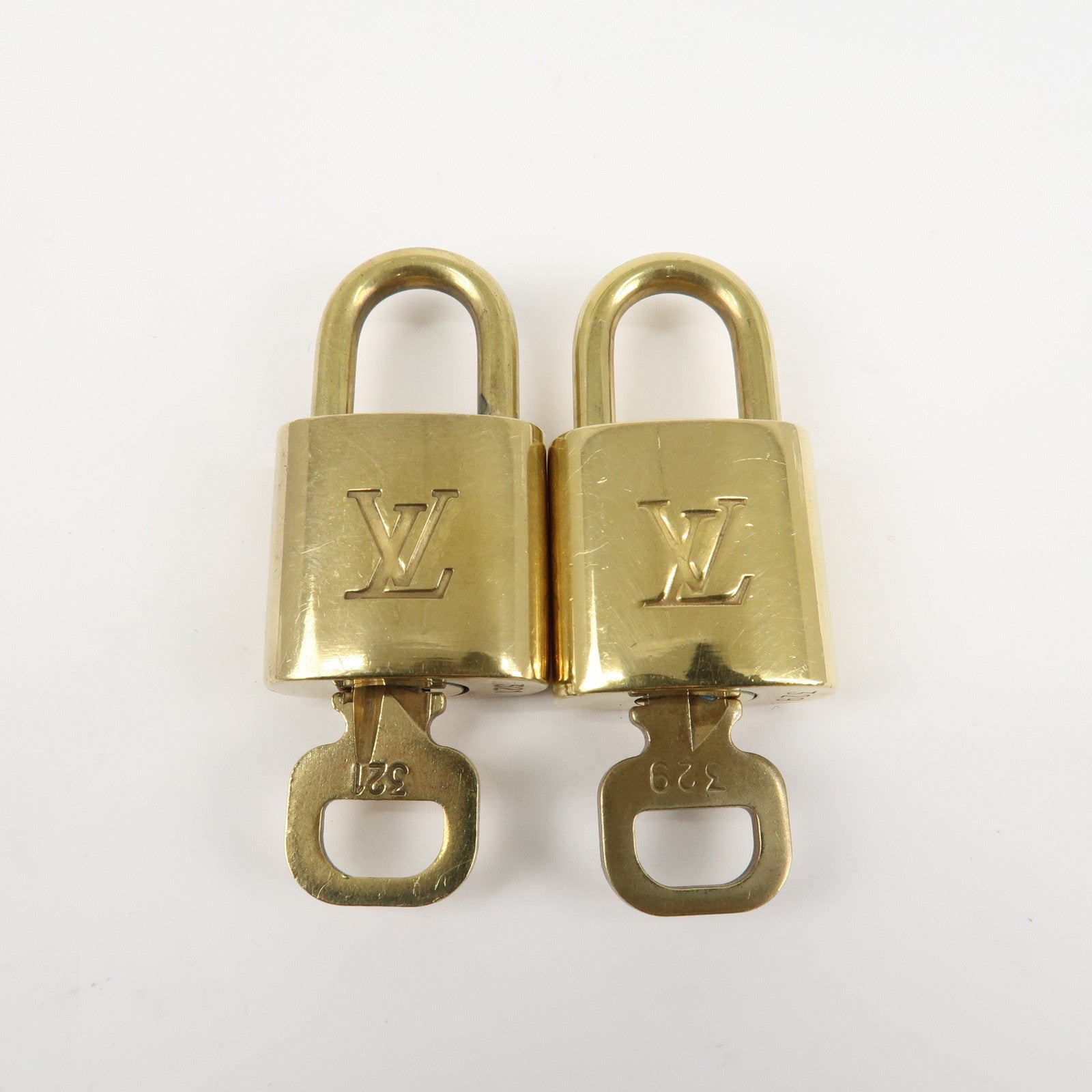 Louis Vuitton Set of 10 Lock 
Key Cadena Key Lock Metal Gold Used