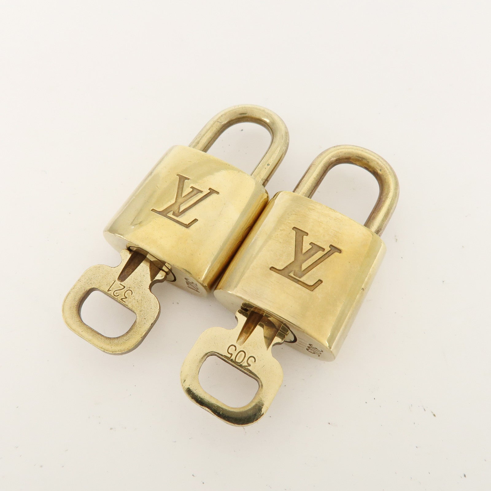 Louis Vuitton Set of 10 Lock 
Key Cadena Key Lock Metal Gold Used