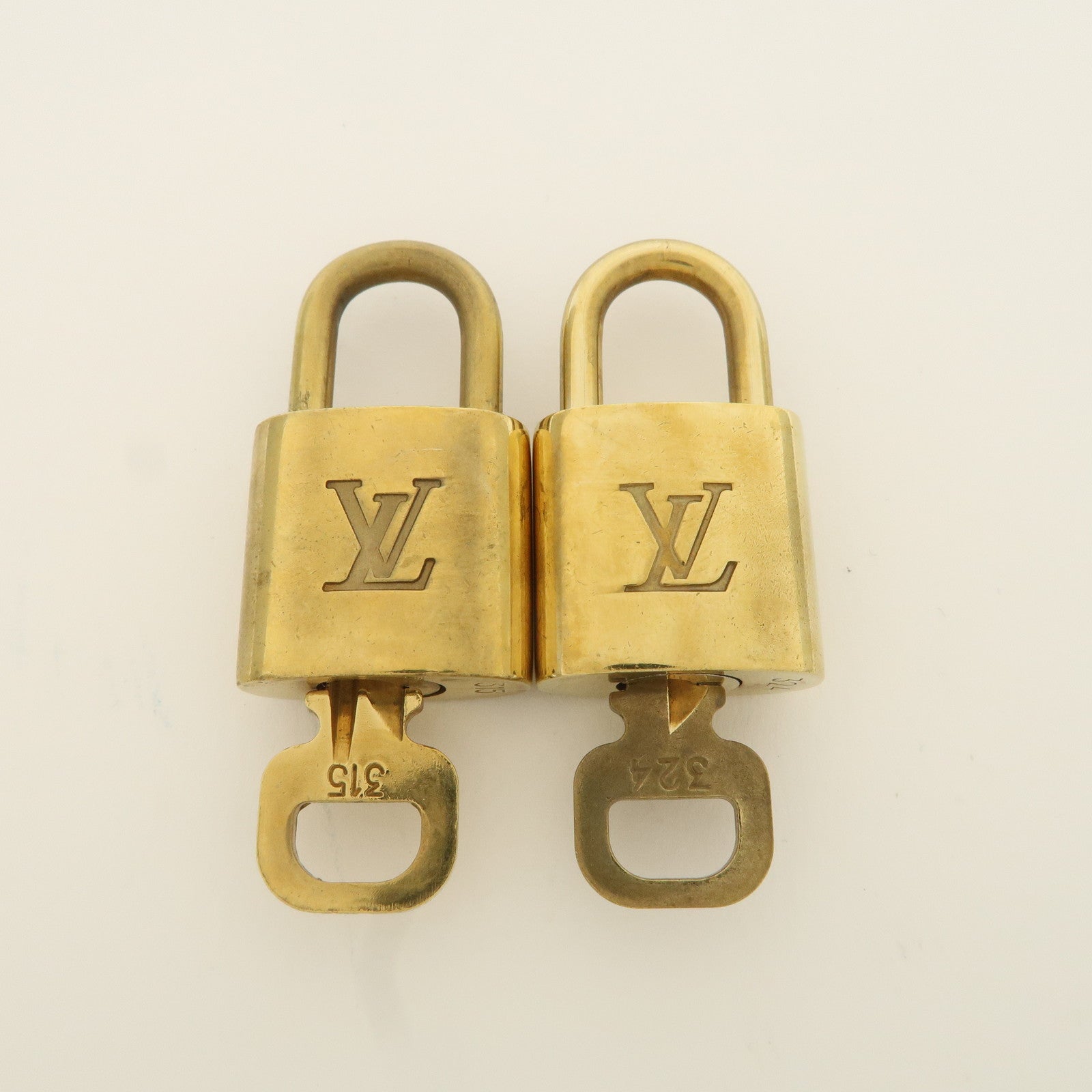 Louis Vuitton Set of 10 Lock 
Key Cadena Key Lock Metal Gold Used