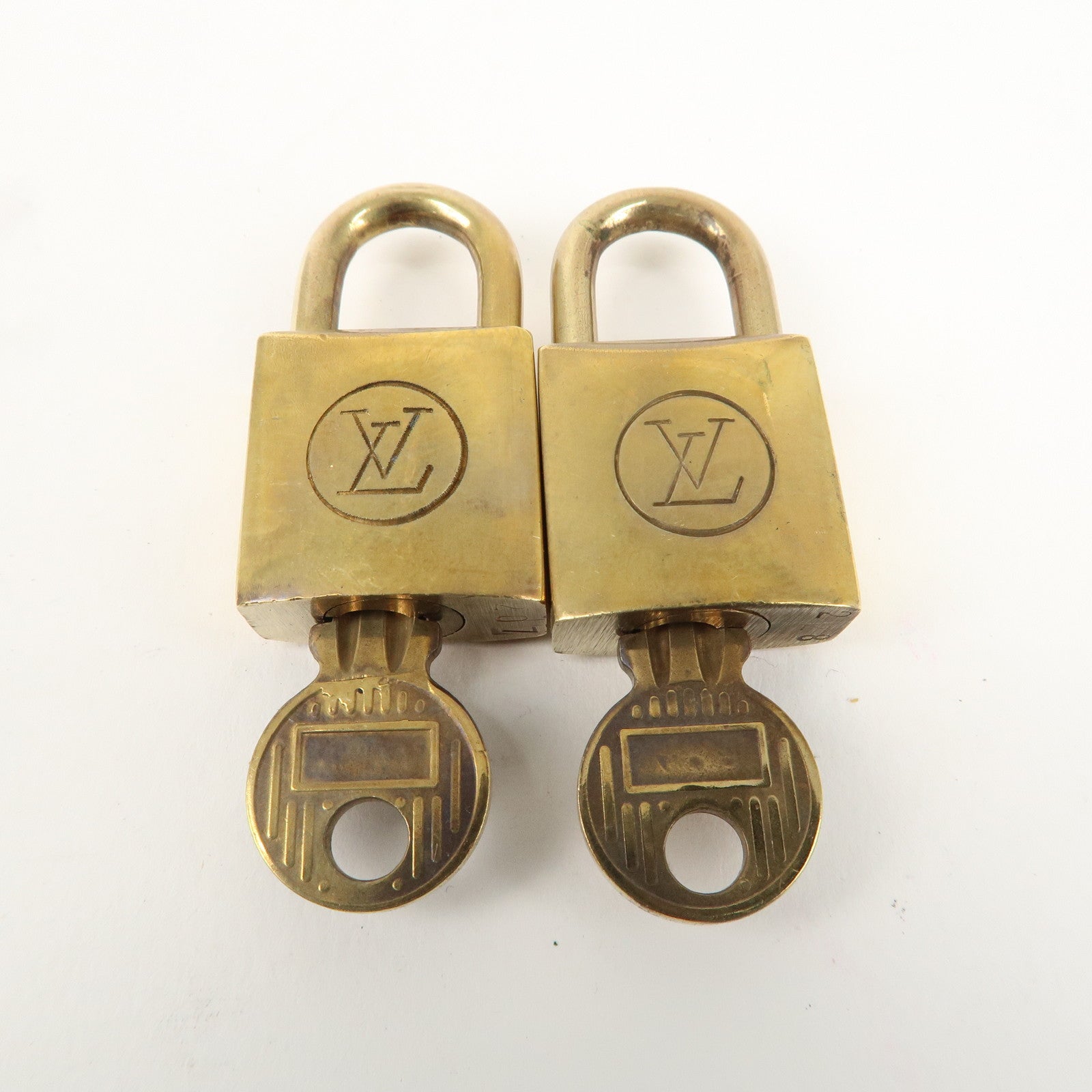 Louis Vuitton Set of 10 Lock 
Key Cadena Key Lock Gold