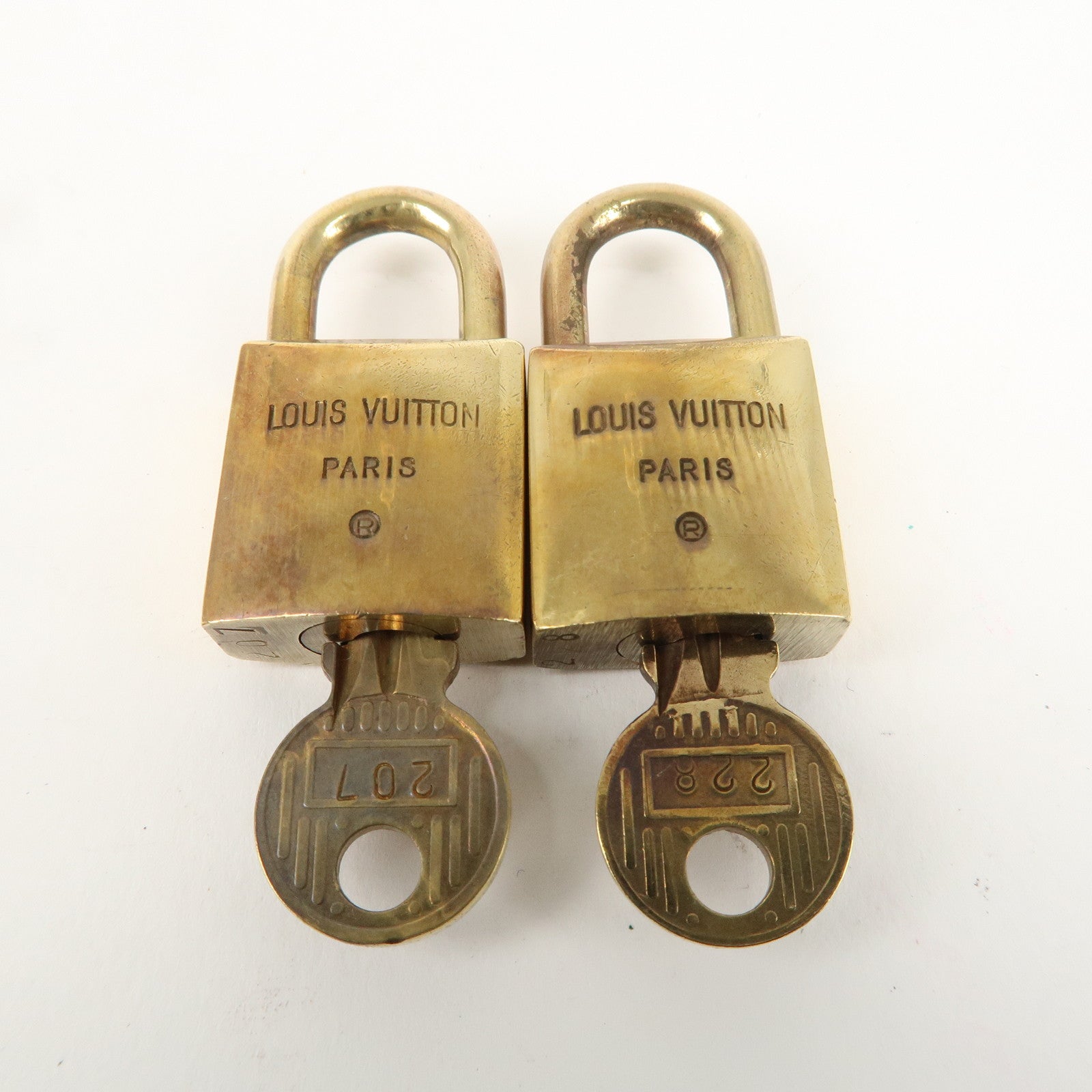 Louis Vuitton Set of 10 Lock 
Key Cadena Key Lock Gold