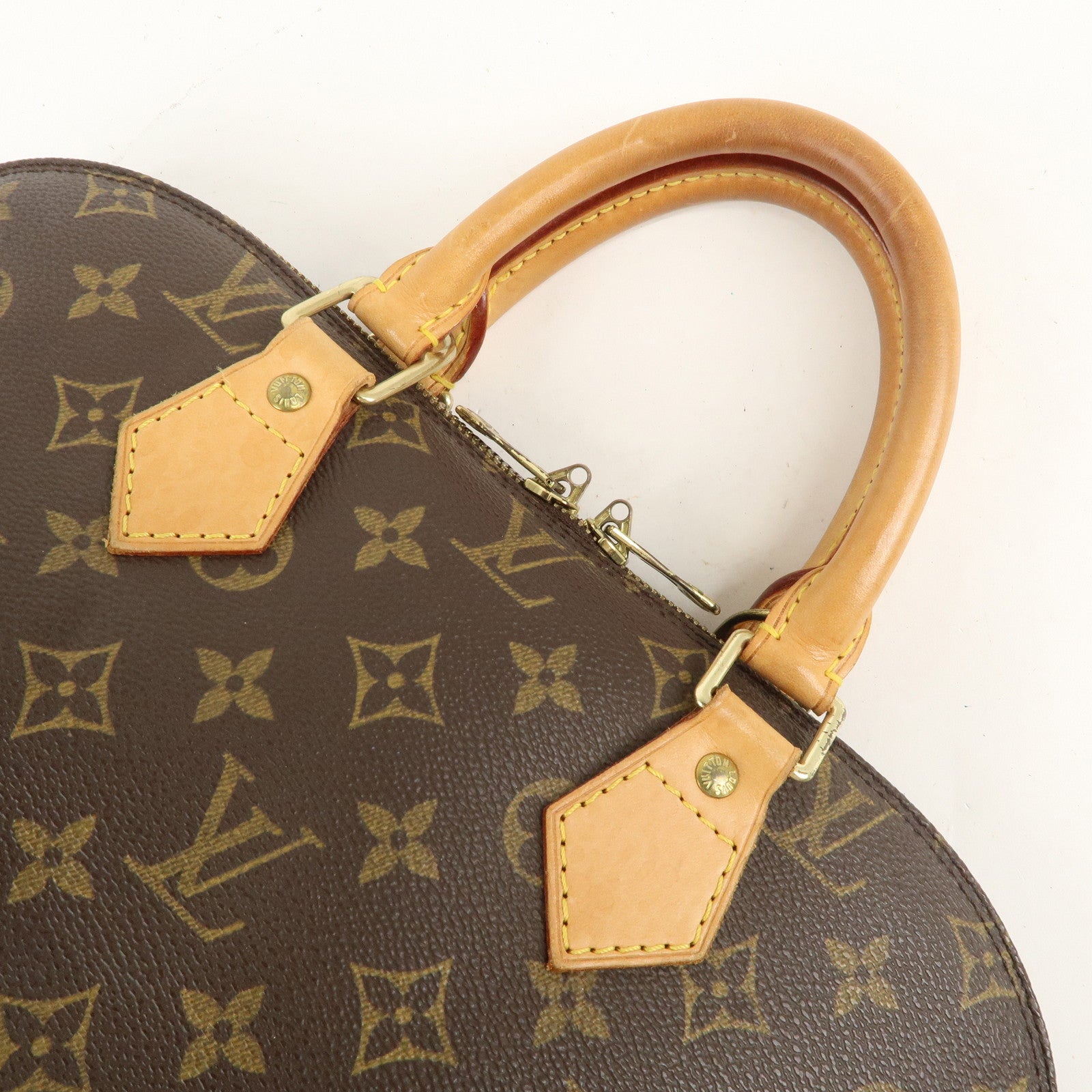 Louis Vuitton Monogram Alma Hand Bag Brown M51130