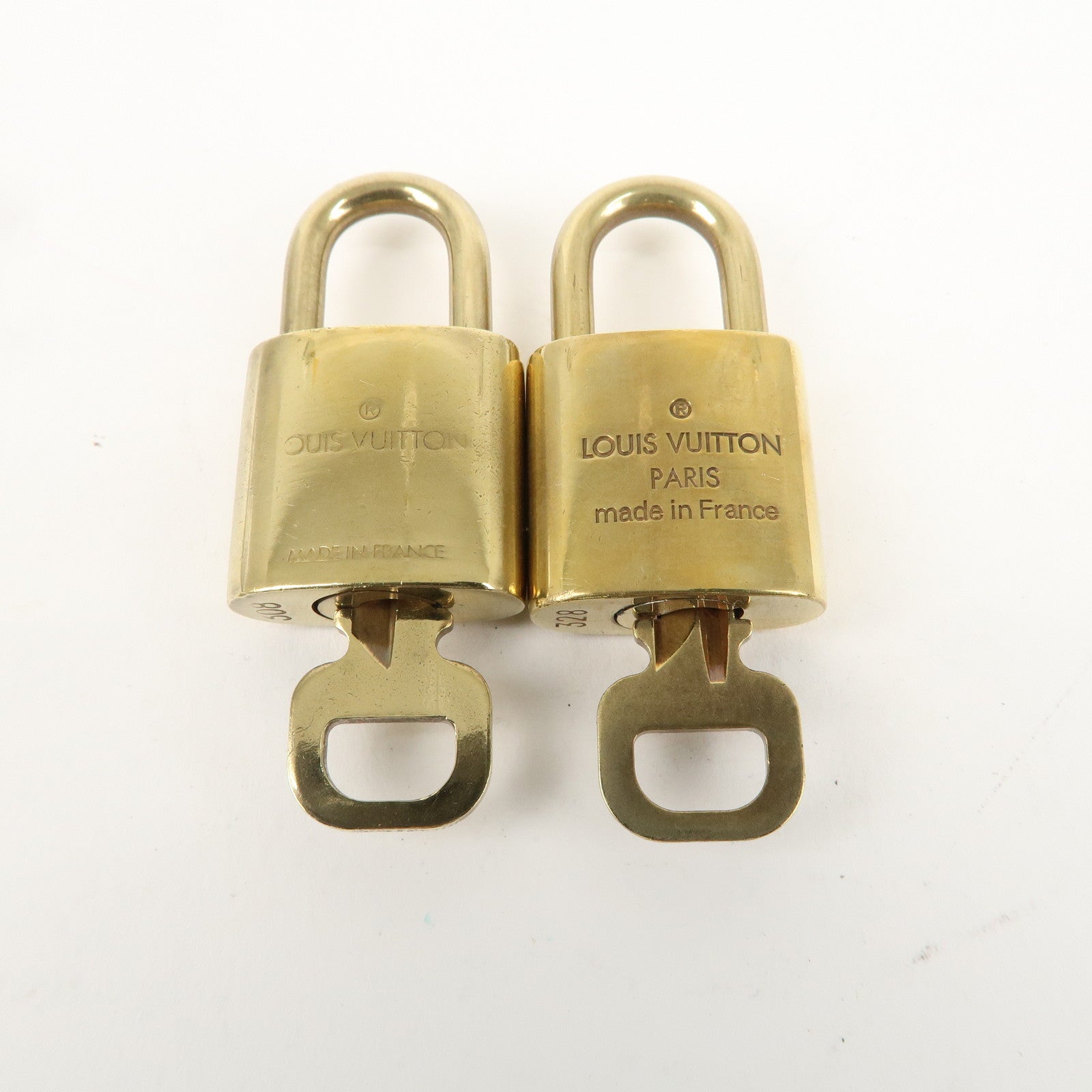 Louis Vuitton Set of 10 Lock 
Key Cadena Key Lock Gold