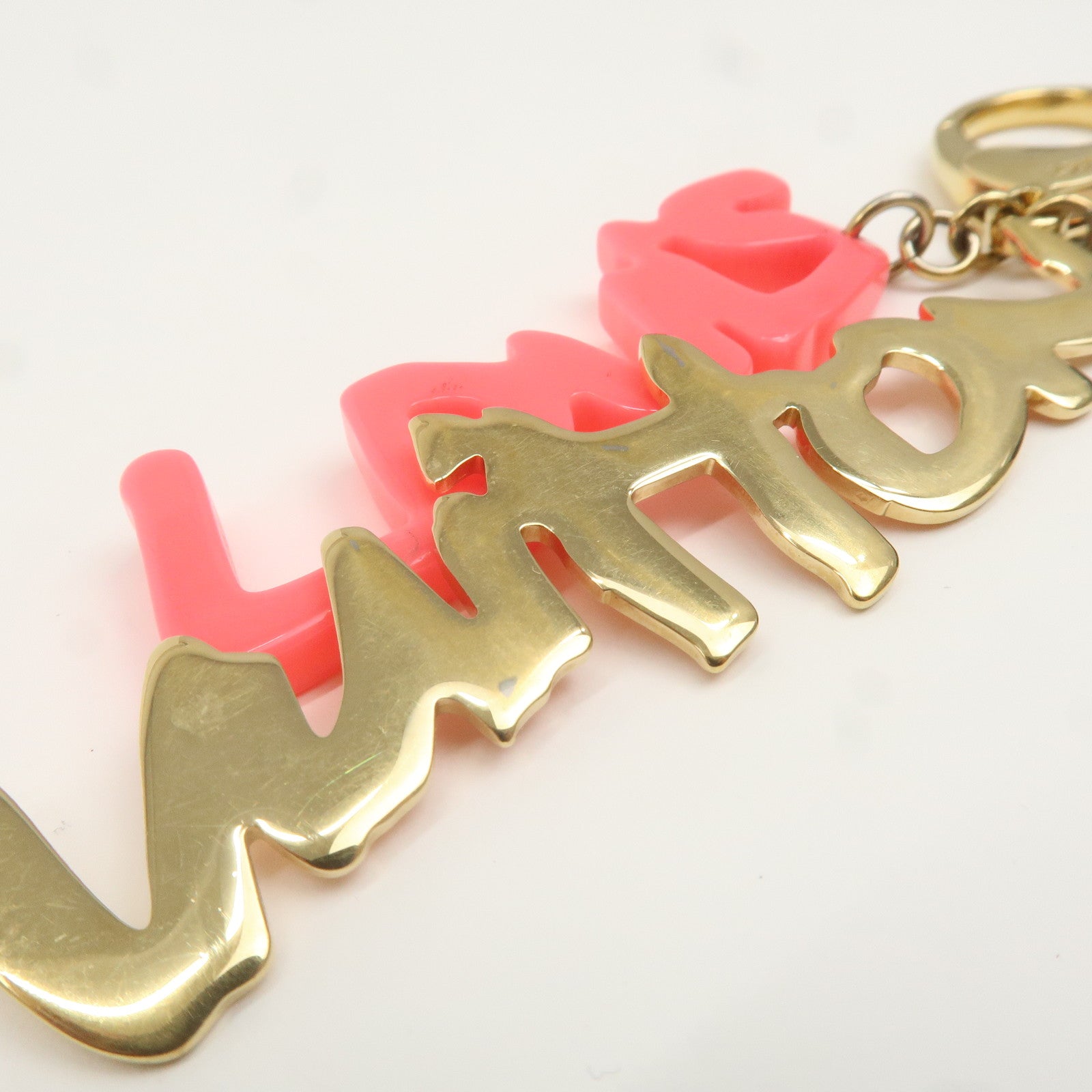 Louis Vuitton Bijou Sac Graffiti Bag Charm Gold Pink M65765