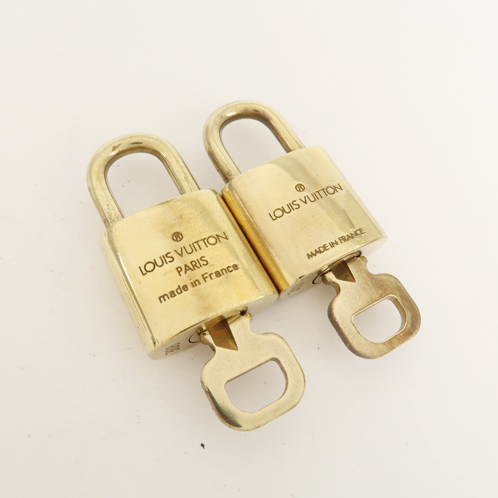 Louis Vuitton Set of 10 Lock 
Key Cadena Key Lock Metal Gold