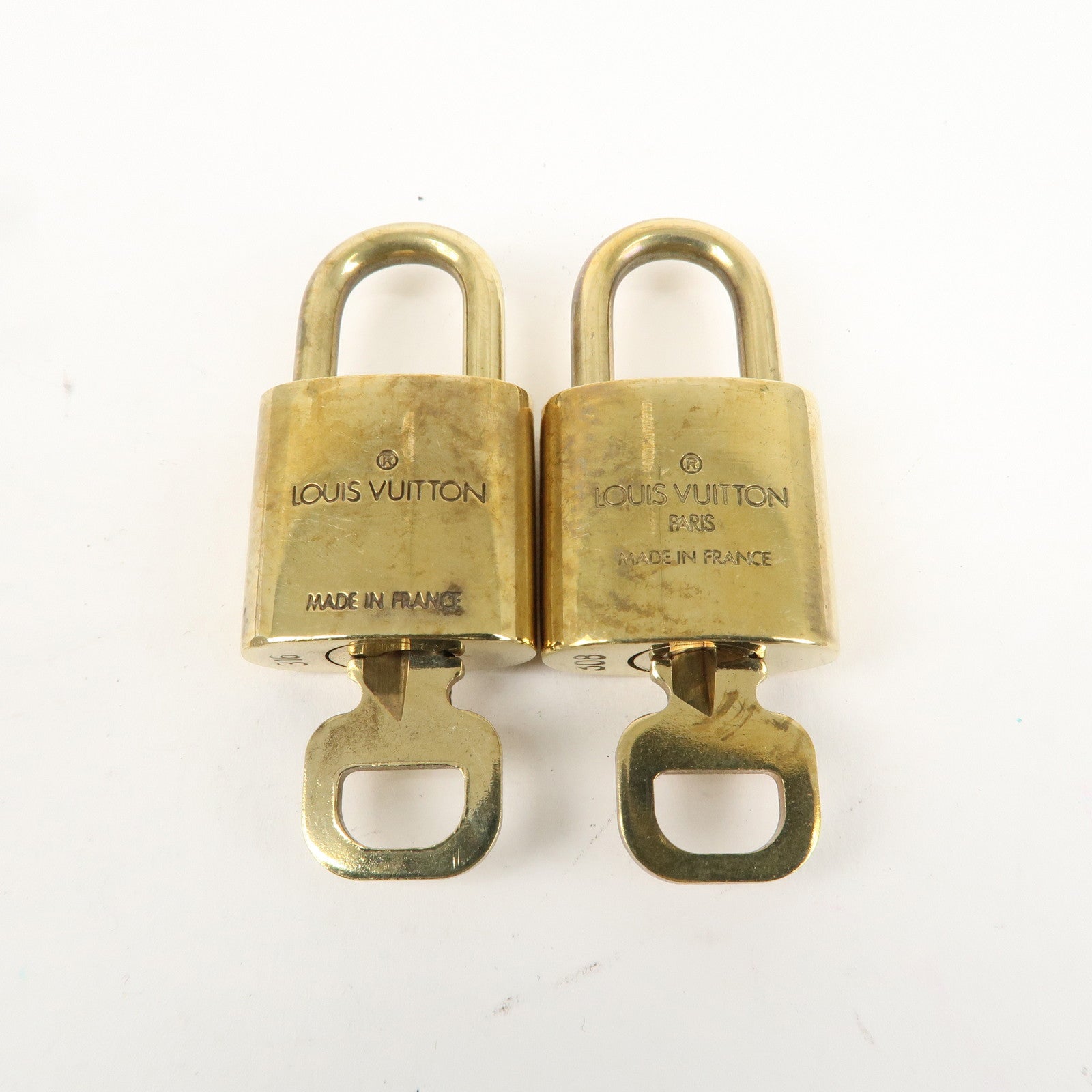 Louis Vuitton Set of 10 Lock 
Key Cadena Key Lock Gold