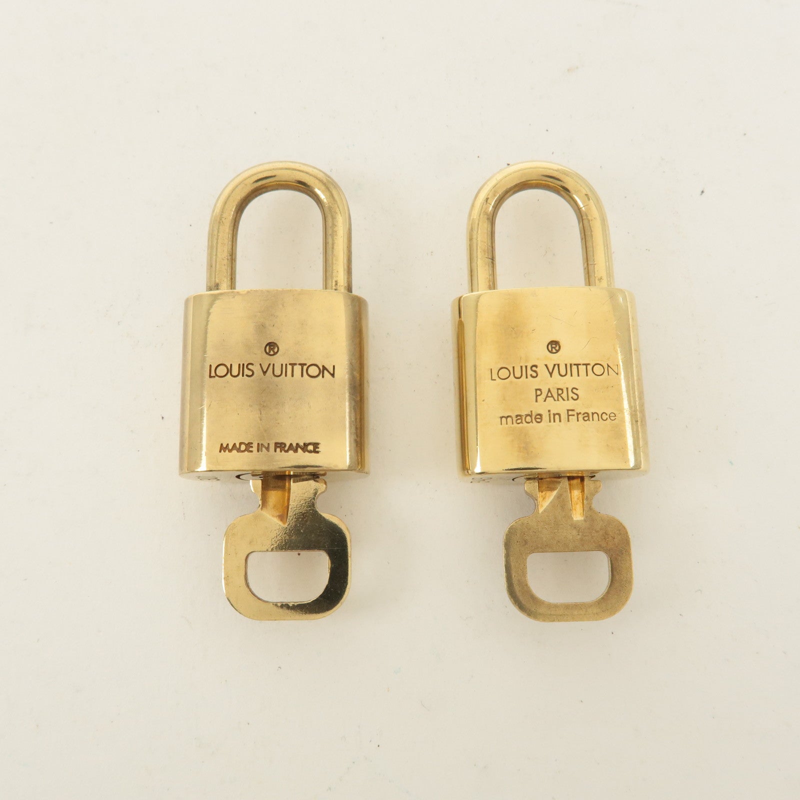 Louis Vuitton Set of 10 Lock 
Key Cadena Key Lock Gold