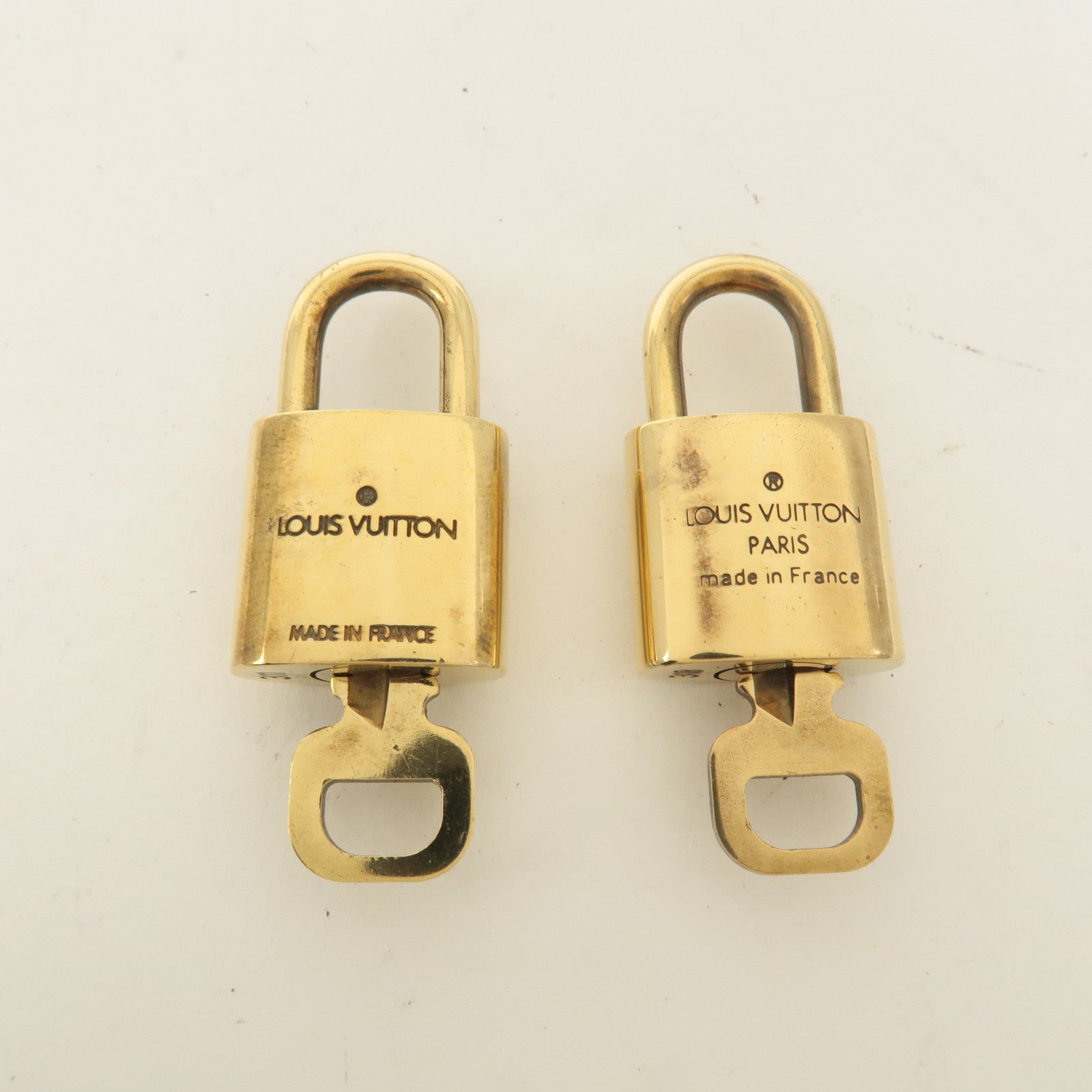 Louis Vuitton Set of 10 Lock 
Key Cadena Key Lock Gold