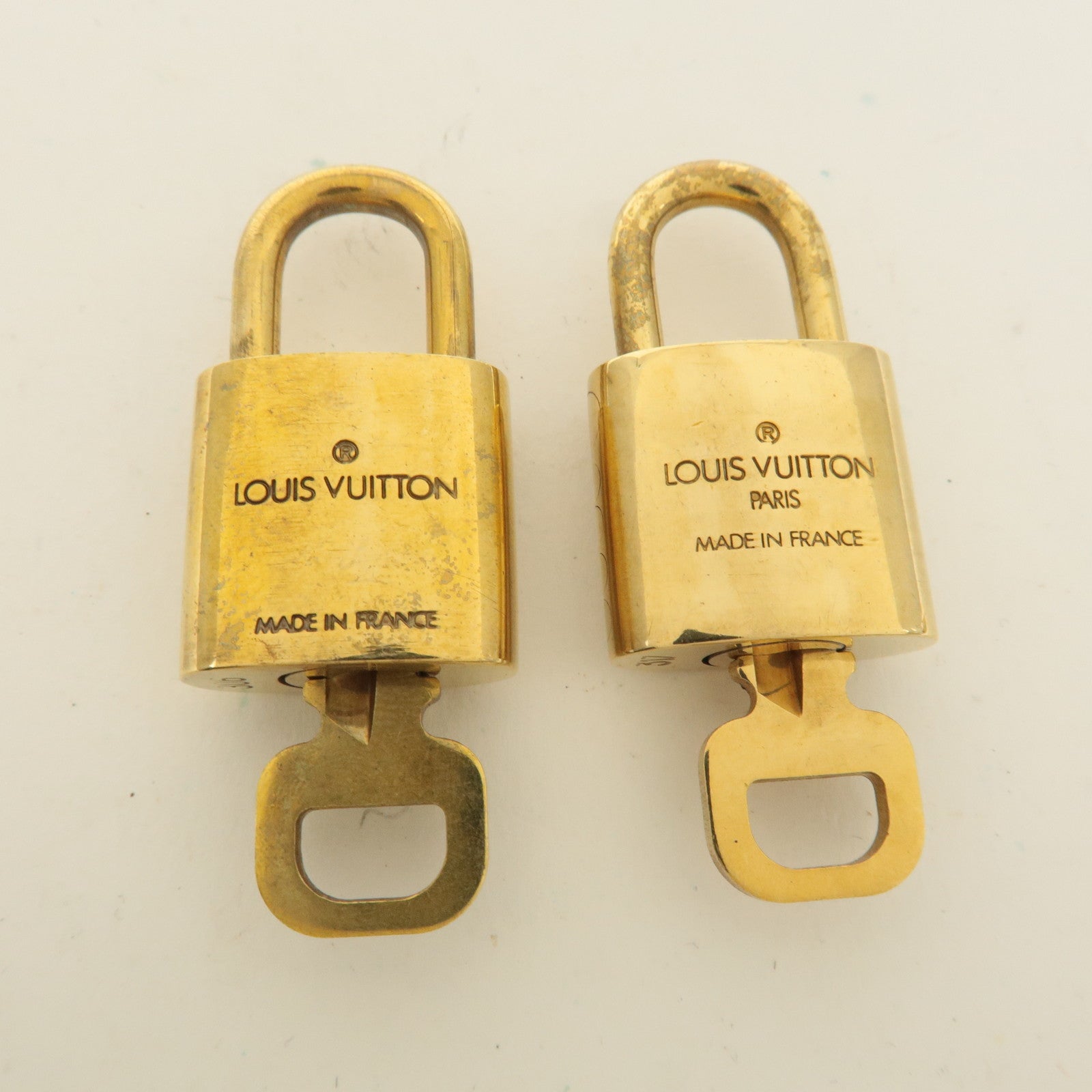 Louis Vuitton Set of 10 Lock 
Key Cadena Key Lock Gold