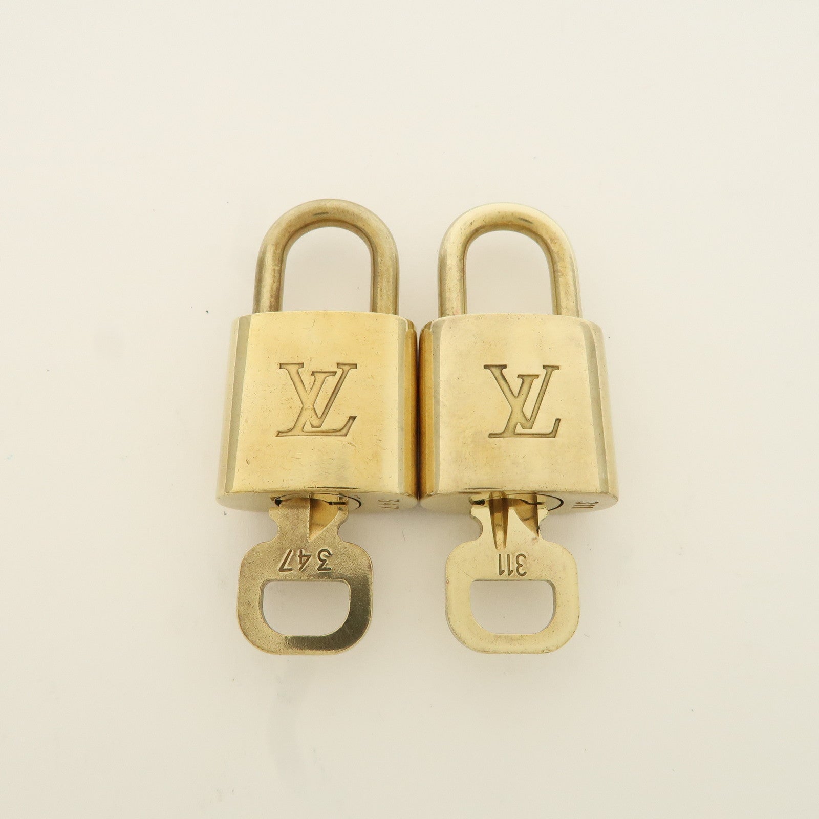 Louis Vuitton Set of 10 Lock 
Key Cadena Key Lock Metal Gold Used