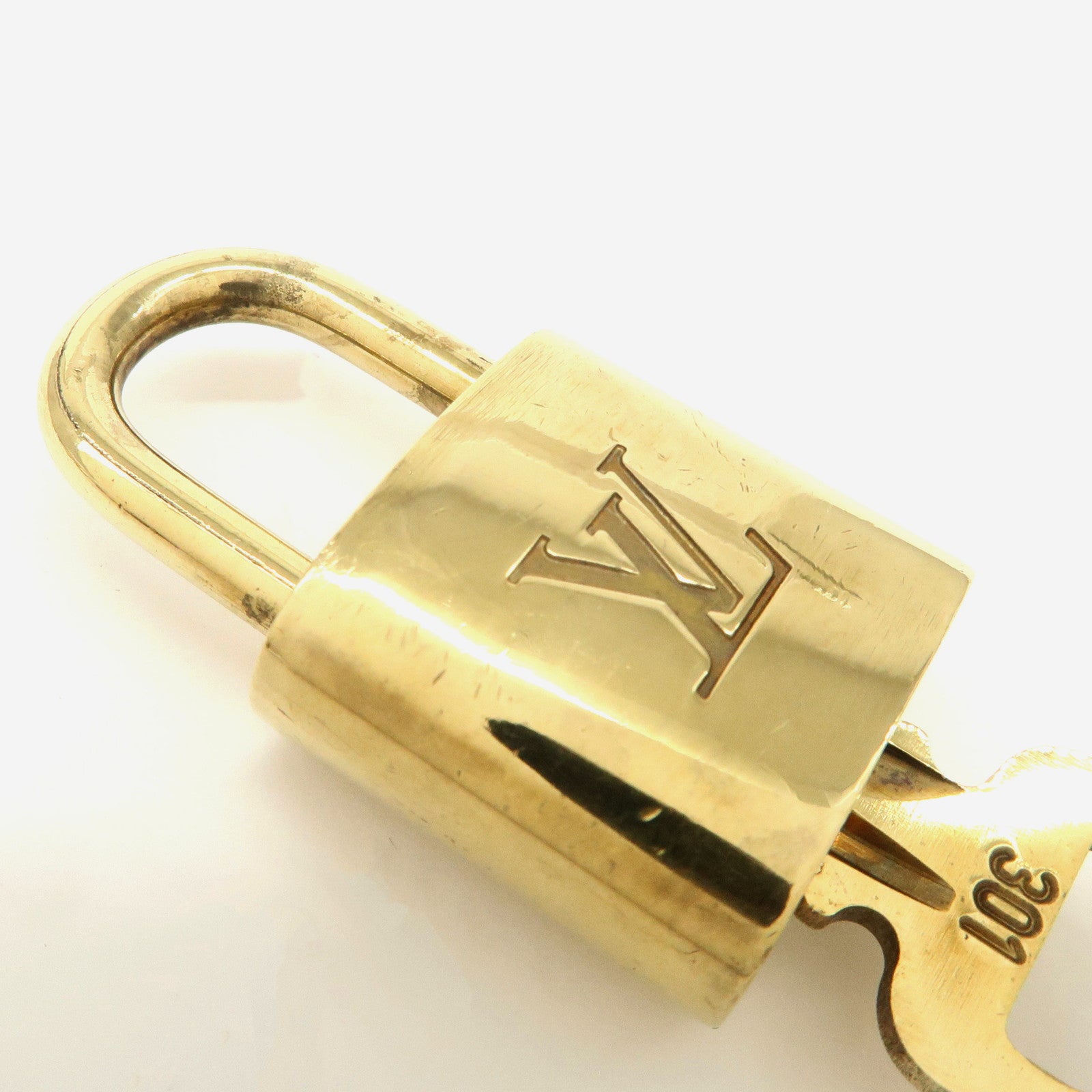 Louis Vuitton Set of 10 Lock 
Key Cadena Key Lock