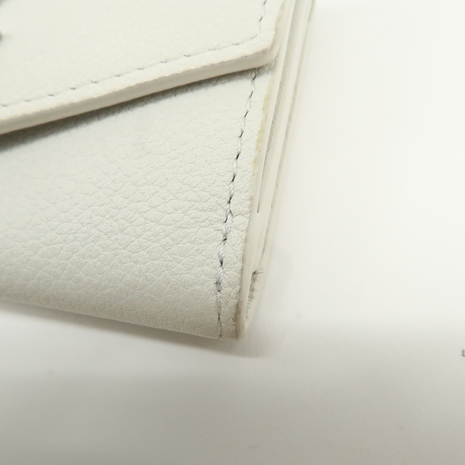 Louis Vuitton Portefeuille Lock Mini Wallet White M68482