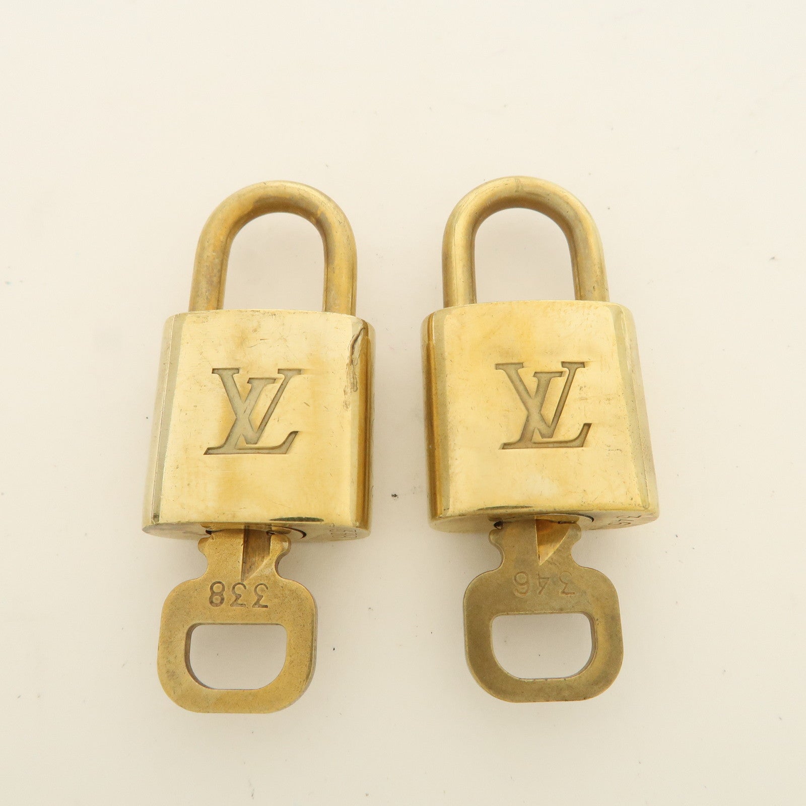 Louis Vuitton Set of 10 Lock 
Key Cadena Key Lock Used