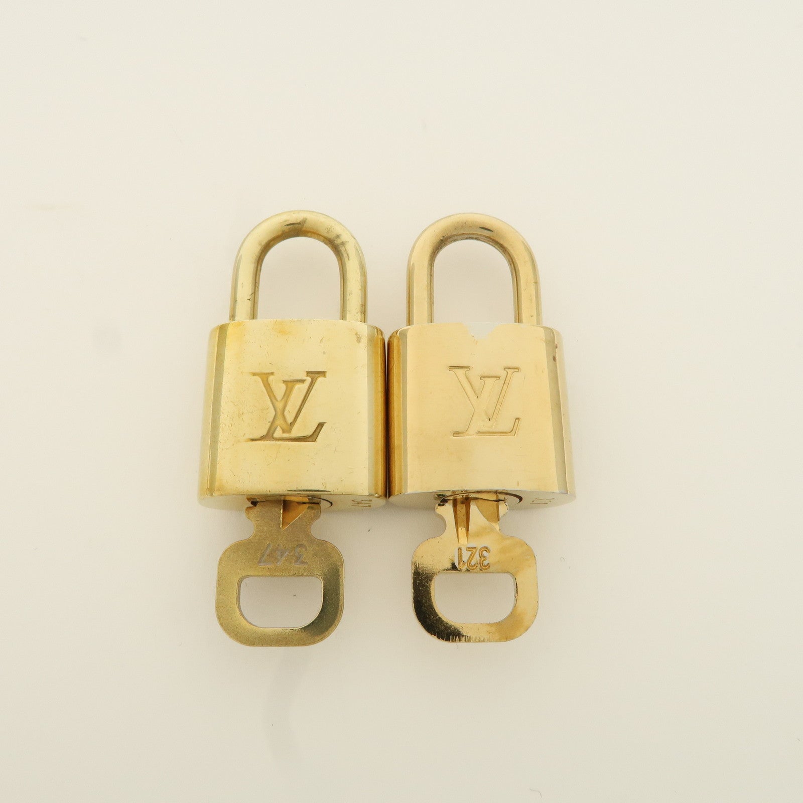 Louis Vuitton Set of 10 Lock 
Key Cadena Key Lock Metal Gold Used